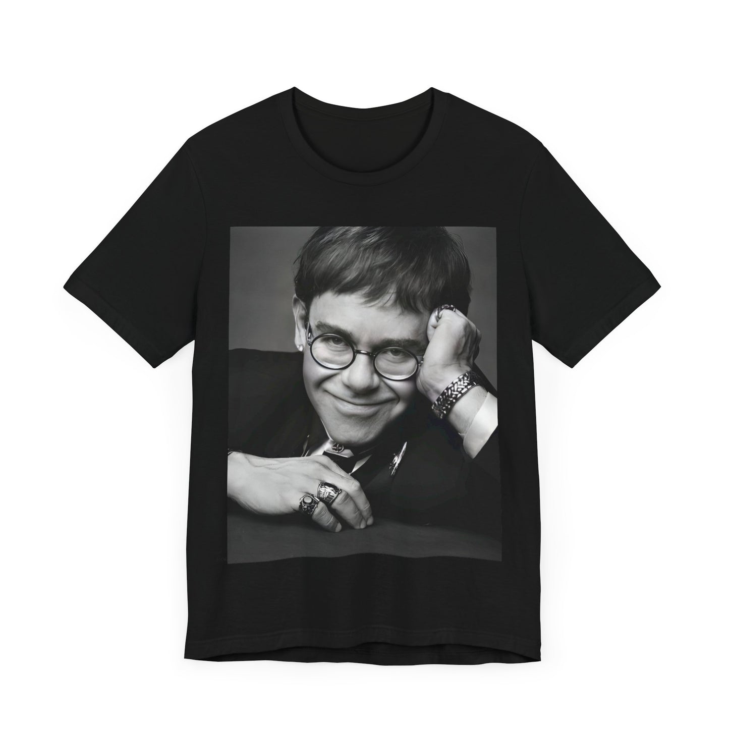 A black graphic t-shirt featuring a retro black and white photo portrait of Elton John.