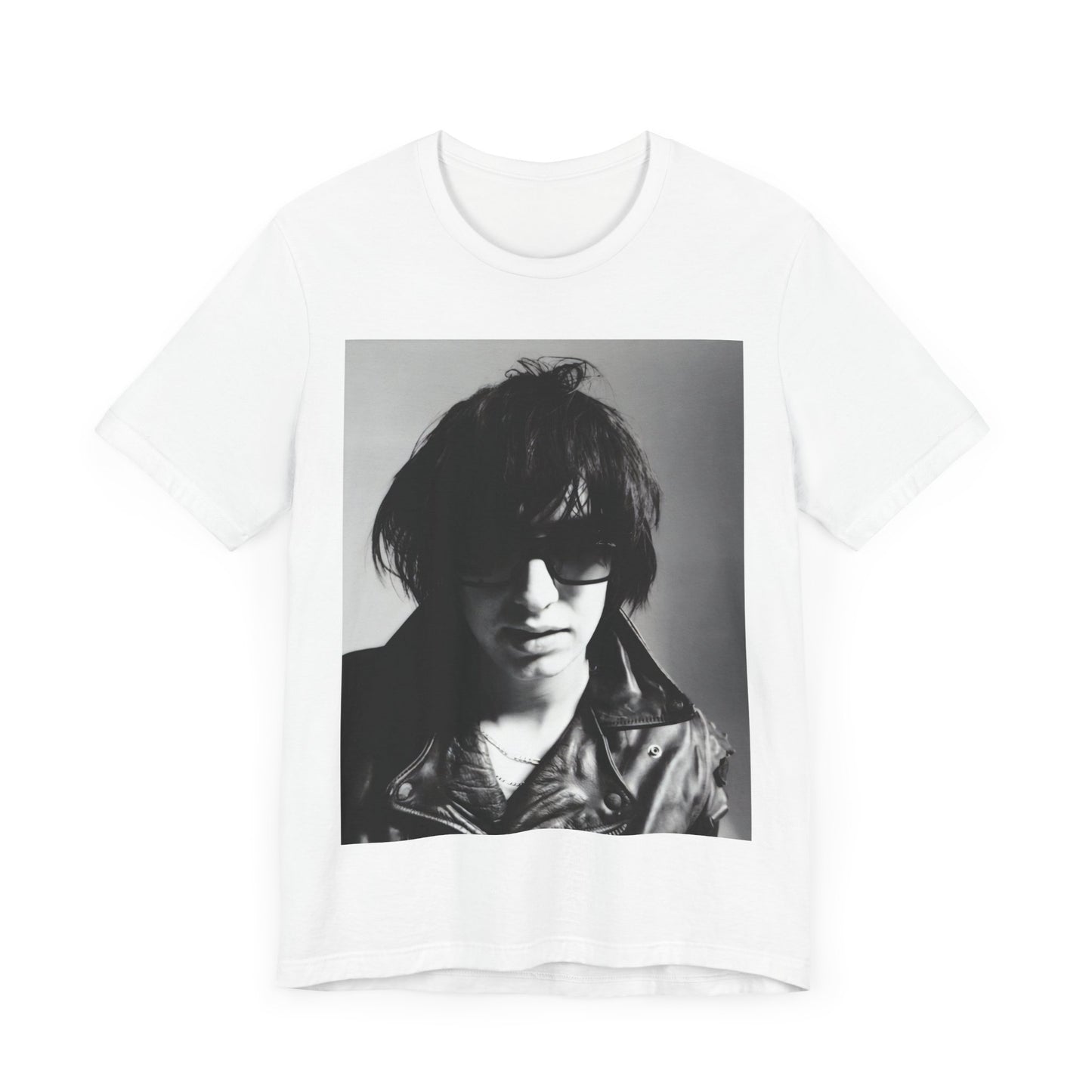 A black graphic t-shirt featuring a graphic related to The Strokes' 'Reptilia' song or era.