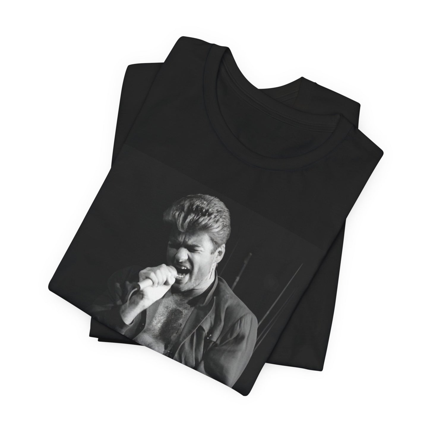 A black graphic t-shirt featuring a glamorous photo or graphic of George Michael performing live.