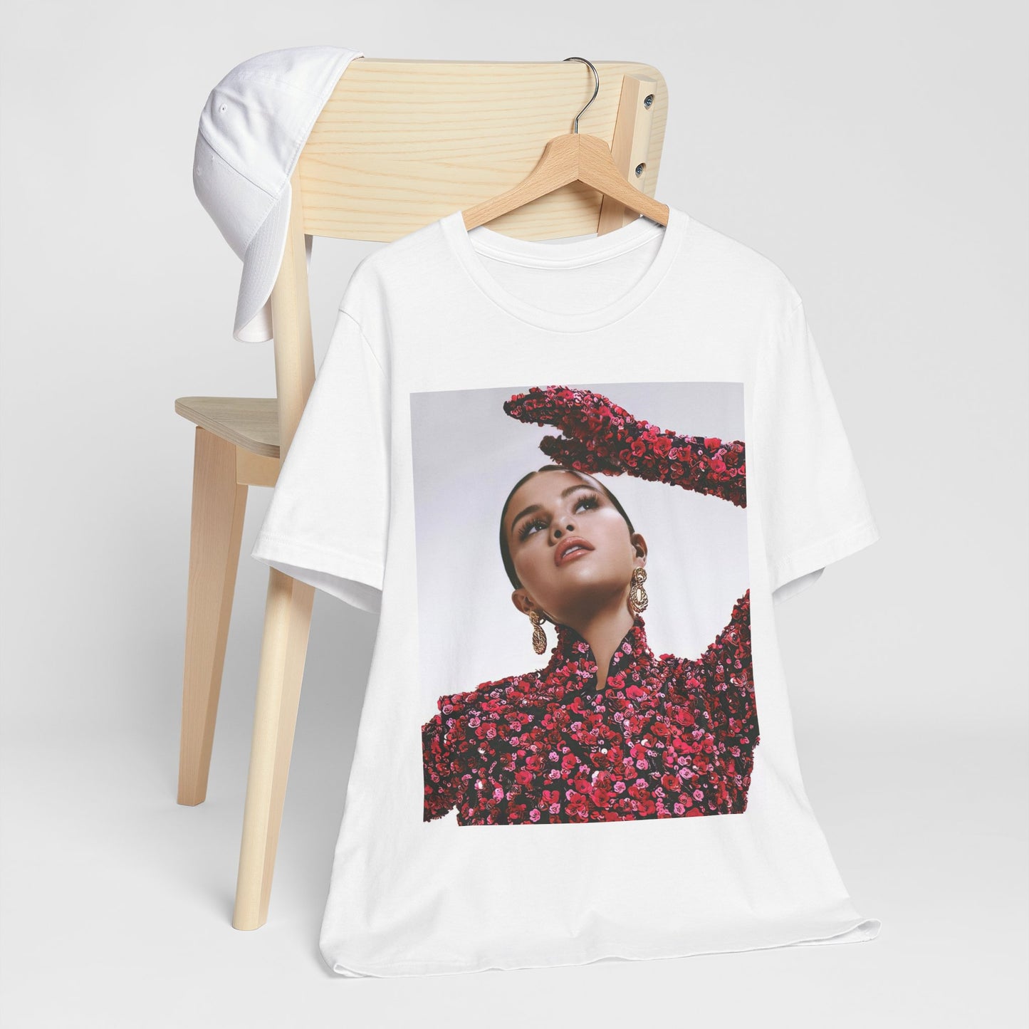 A black graphic t-shirt featuring a classic aesthetic graphic of Selena Gomez.