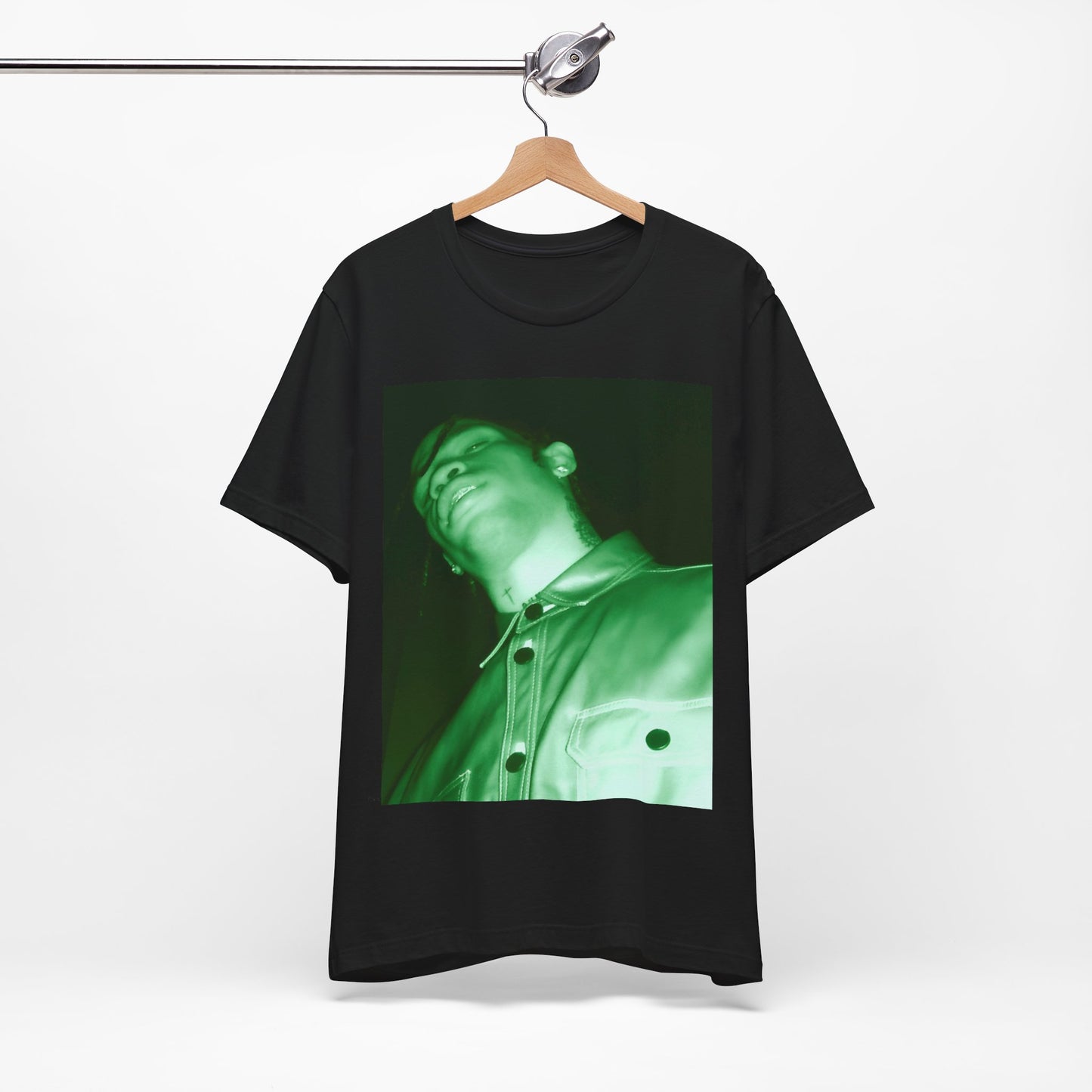 A black graphic t-shirt featuring a graphic of Travis Scott with psychedelic trap vibes.
