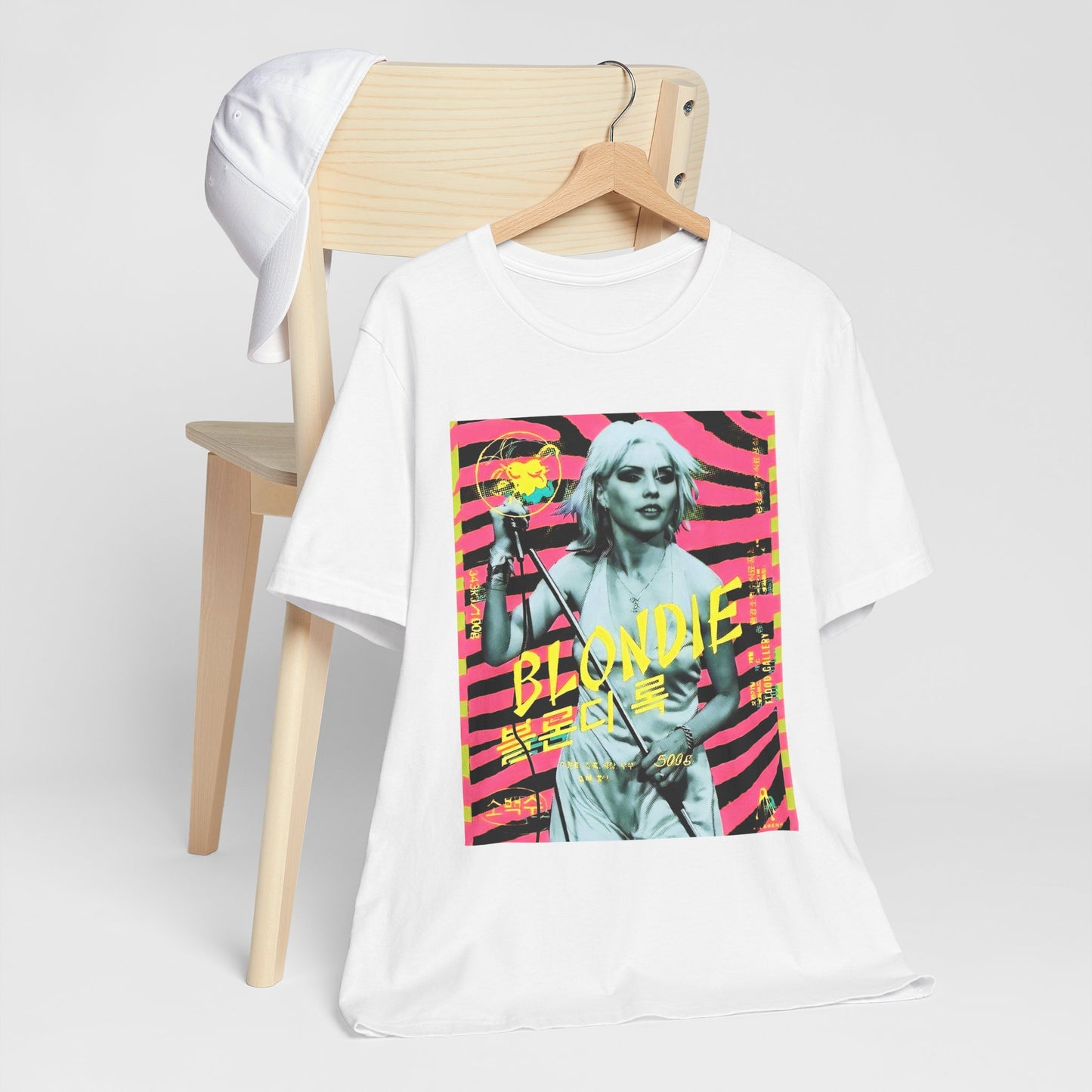 A black graphic t-shirt featuring a retro 70s pop art style graphic of Blondie.