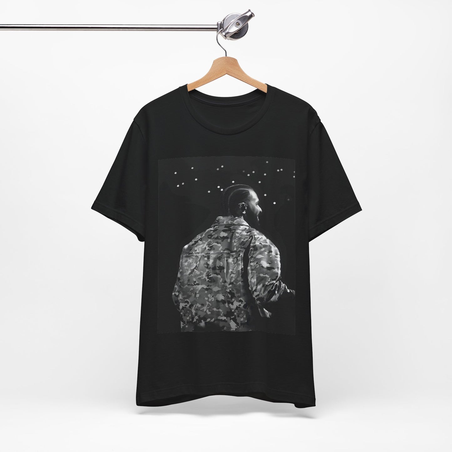 A black graphic t-shirt featuring a black and white graphic or photo of Drake performing live on stage.