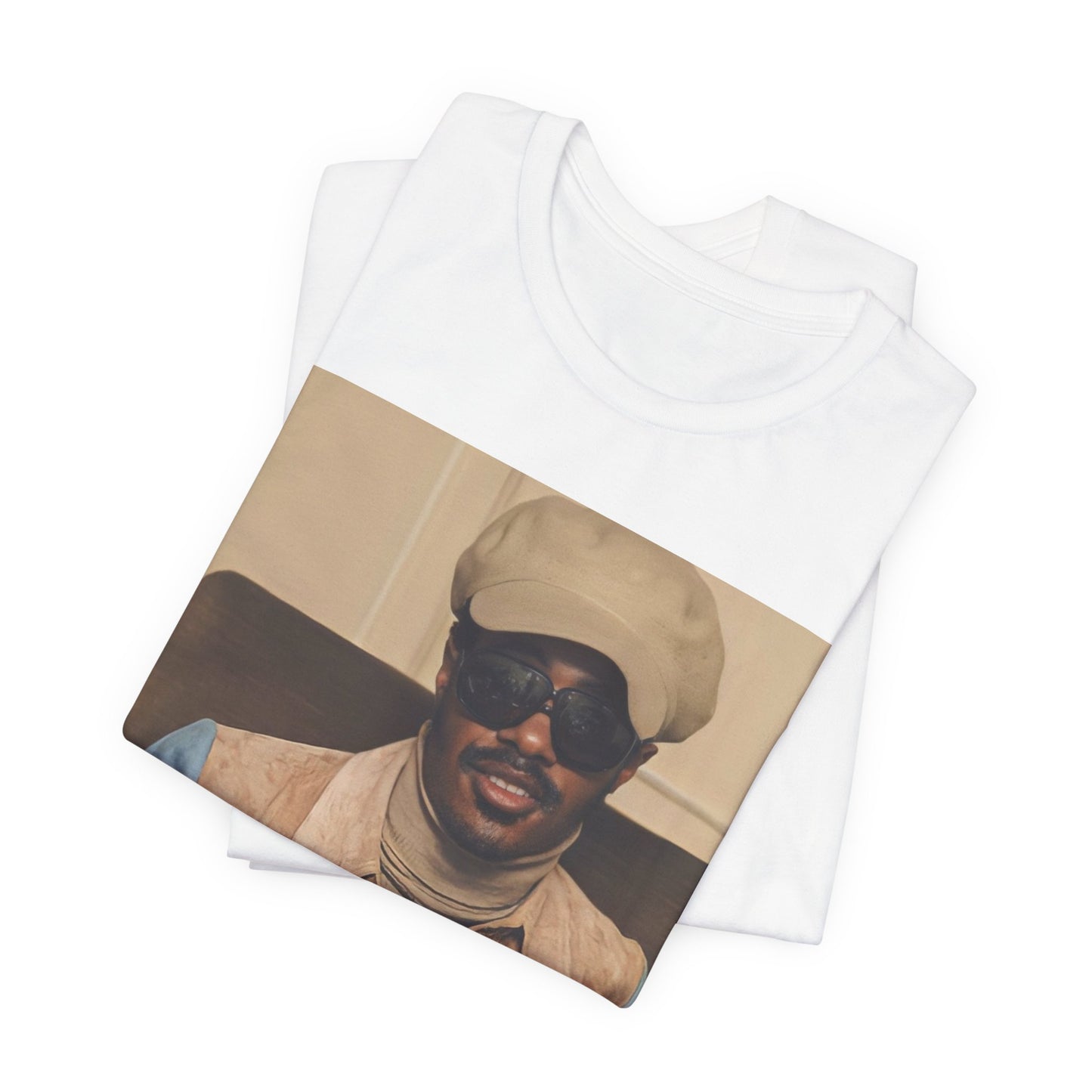 A black graphic t-shirt featuring a retro graphic related to Stevie Wonder's 'Songs in the Key of Life' album era.