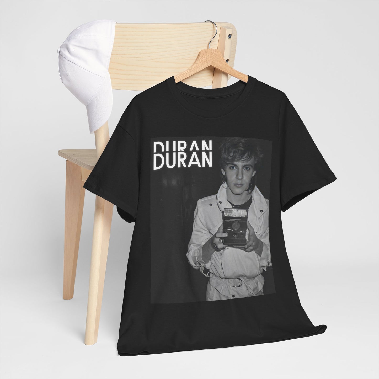 A black graphic t-shirt featuring an 80s black and white Polaroid-style photo of Duran Duran.