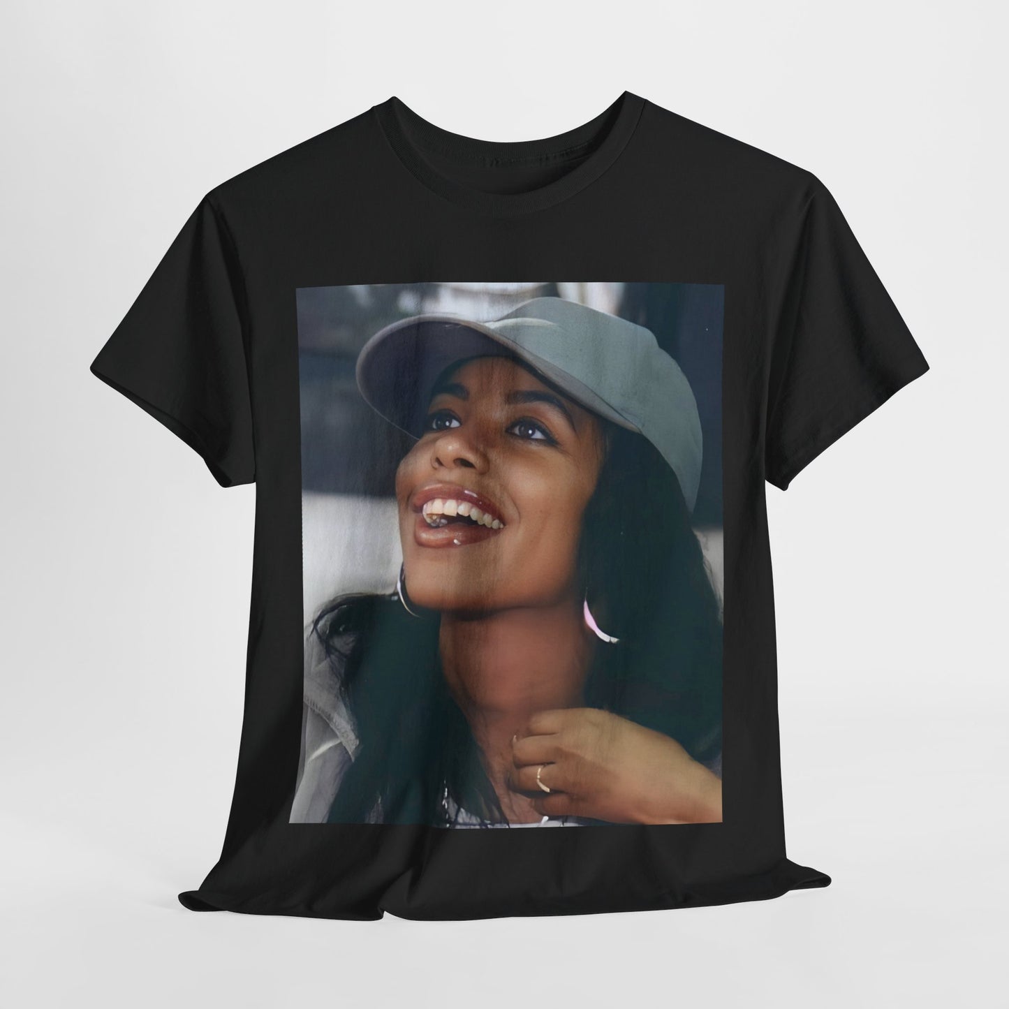 A black graphic t-shirt featuring a vintage street style icon graphic of Aaliyah.