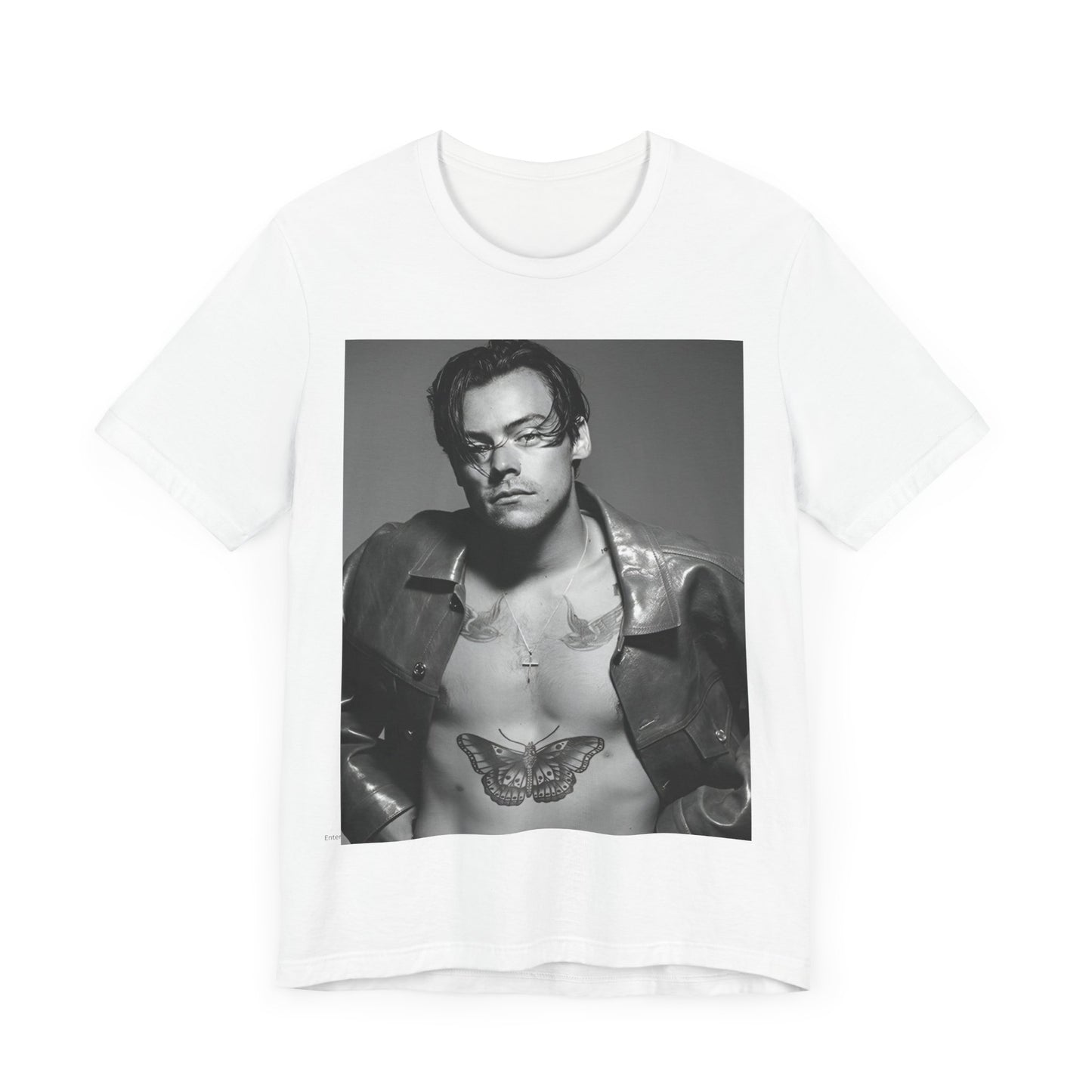 A black graphic t-shirt featuring a black and white portrait photo of Harry Styles.