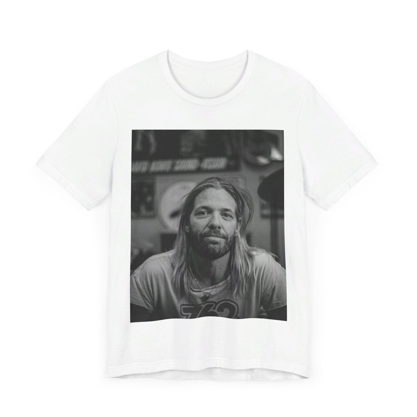 A black graphic t-shirt featuring a tribute graphic for Taylor Hawkins of Foo Fighters.