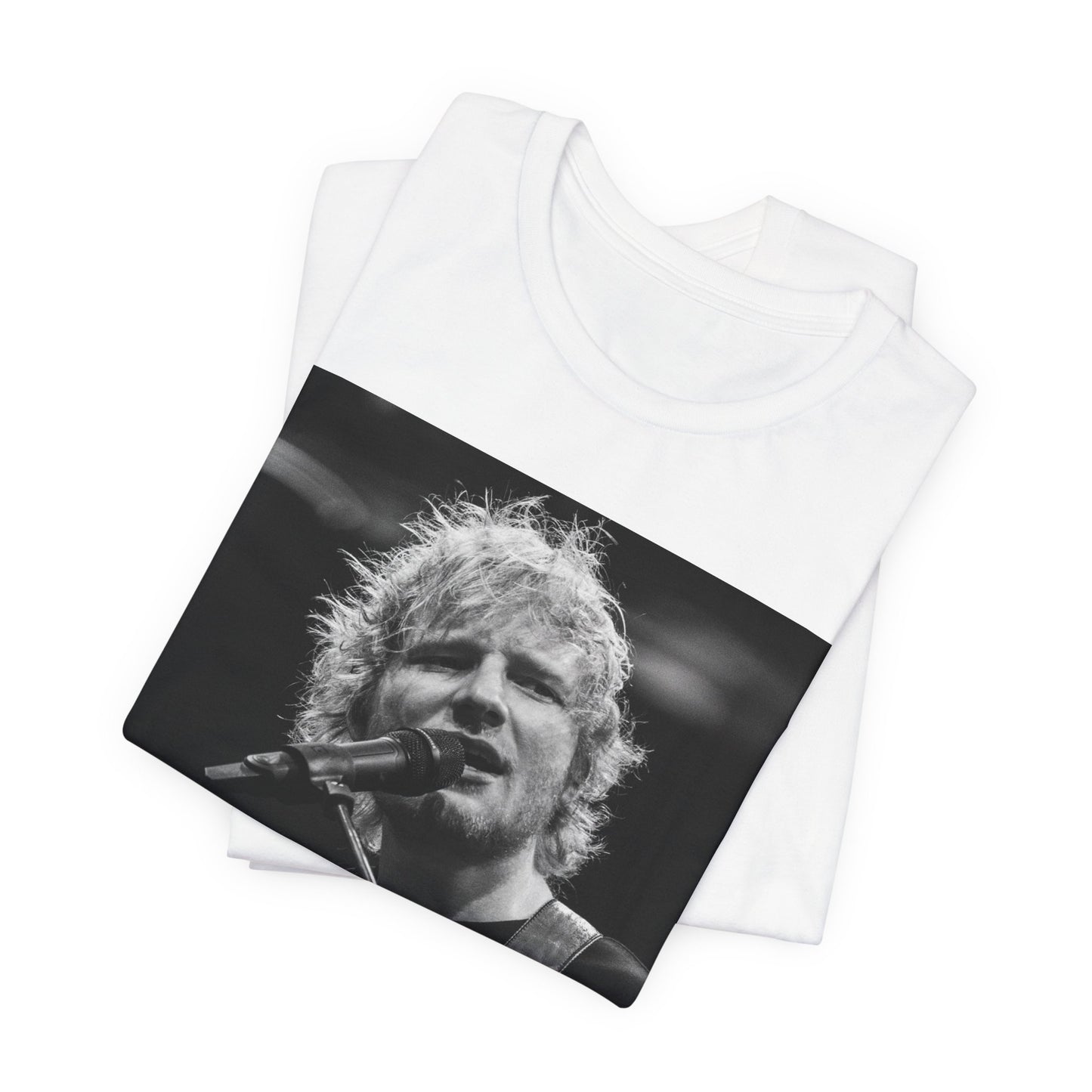 A black graphic t-shirt featuring a black and white photo of Ed Sheeran performing live.