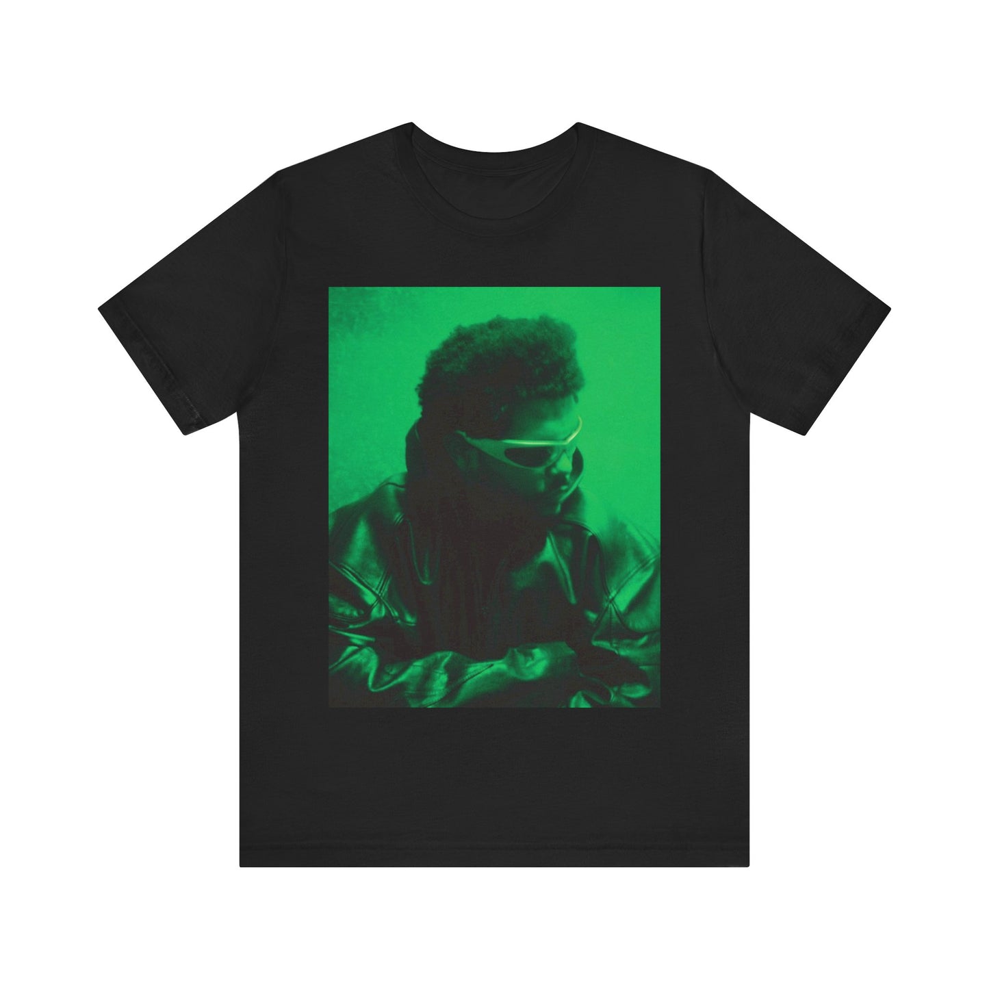 A black graphic t-shirt featuring a vintage graphic related to The Weeknd's 'Kiss Land' era.