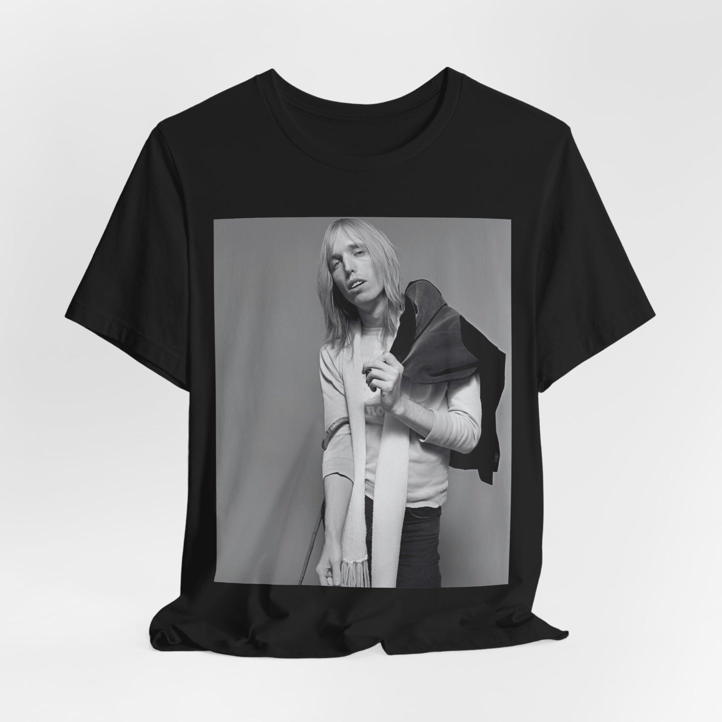A black graphic t-shirt featuring a modern rock essential graphic of Tom Petty.