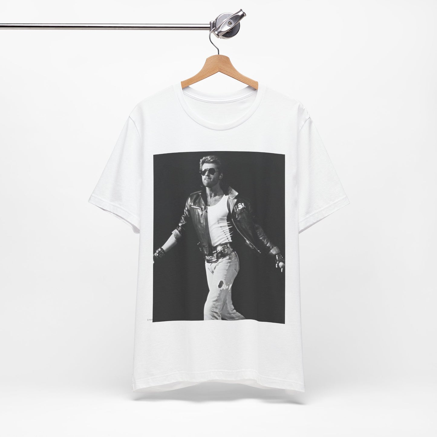 A black graphic t-shirt featuring a retro black and white monochrome graphic or photo of George Michael.