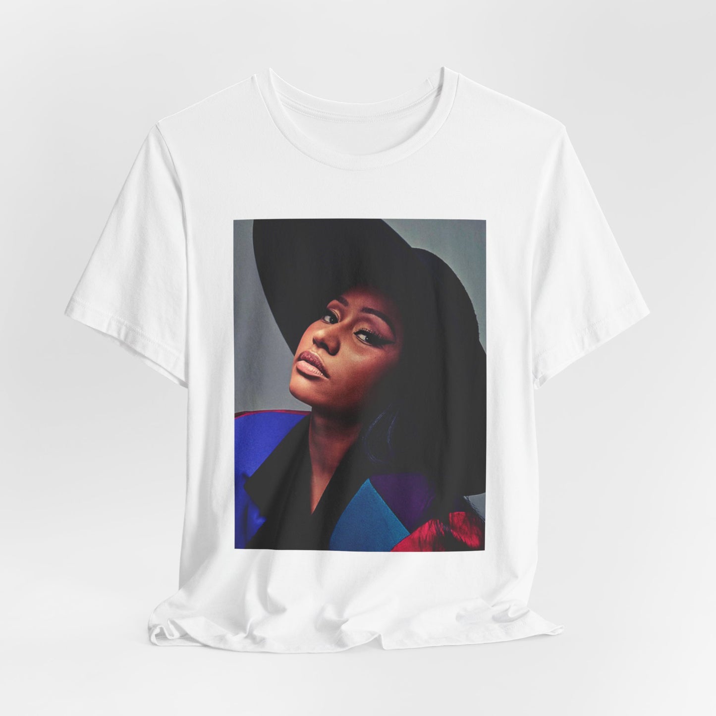 A black graphic t-shirt featuring a graphic of Nicki Minaj as a streetwear icon.