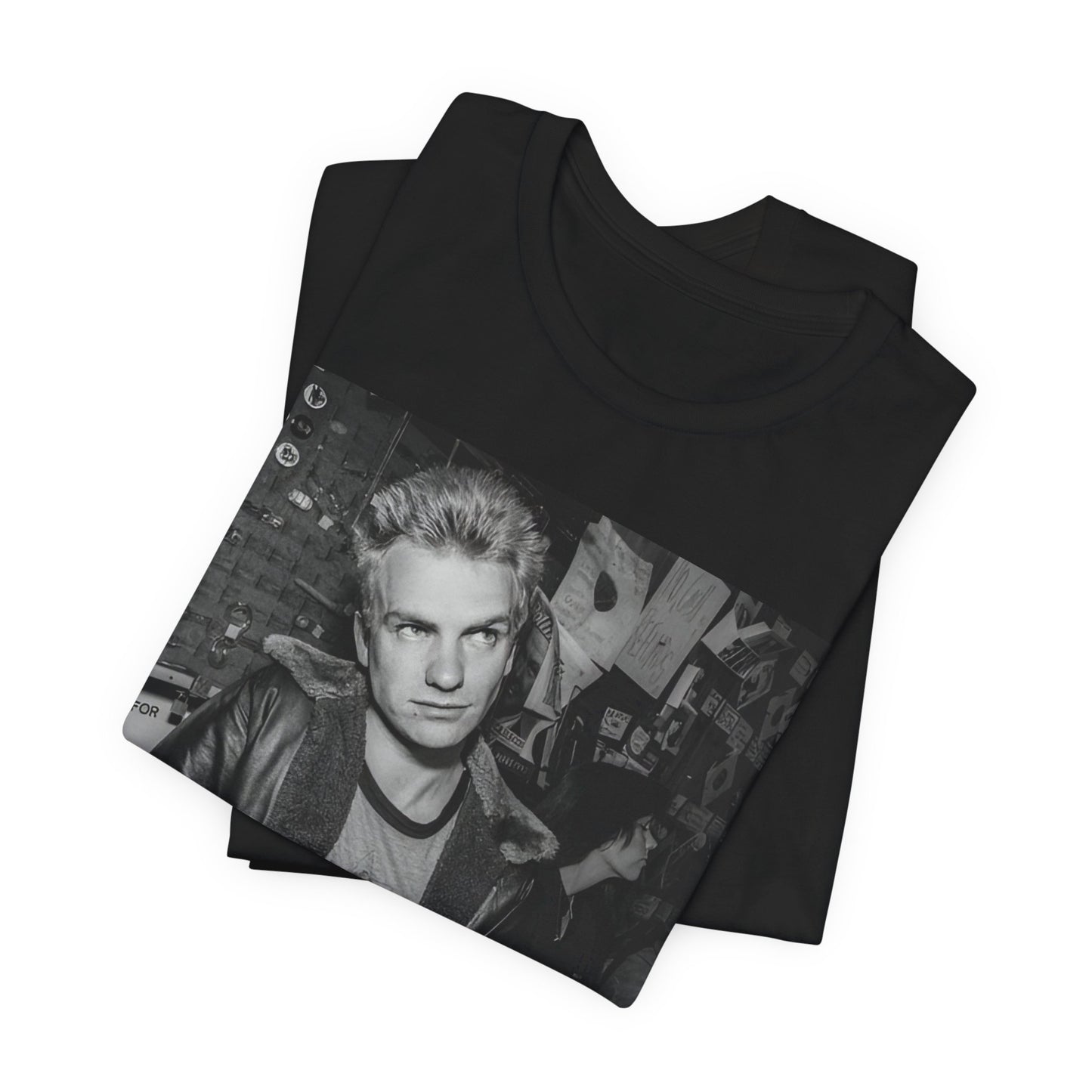 A black graphic t-shirt featuring a vintage black and white monochrome graphic or photo of Sting.