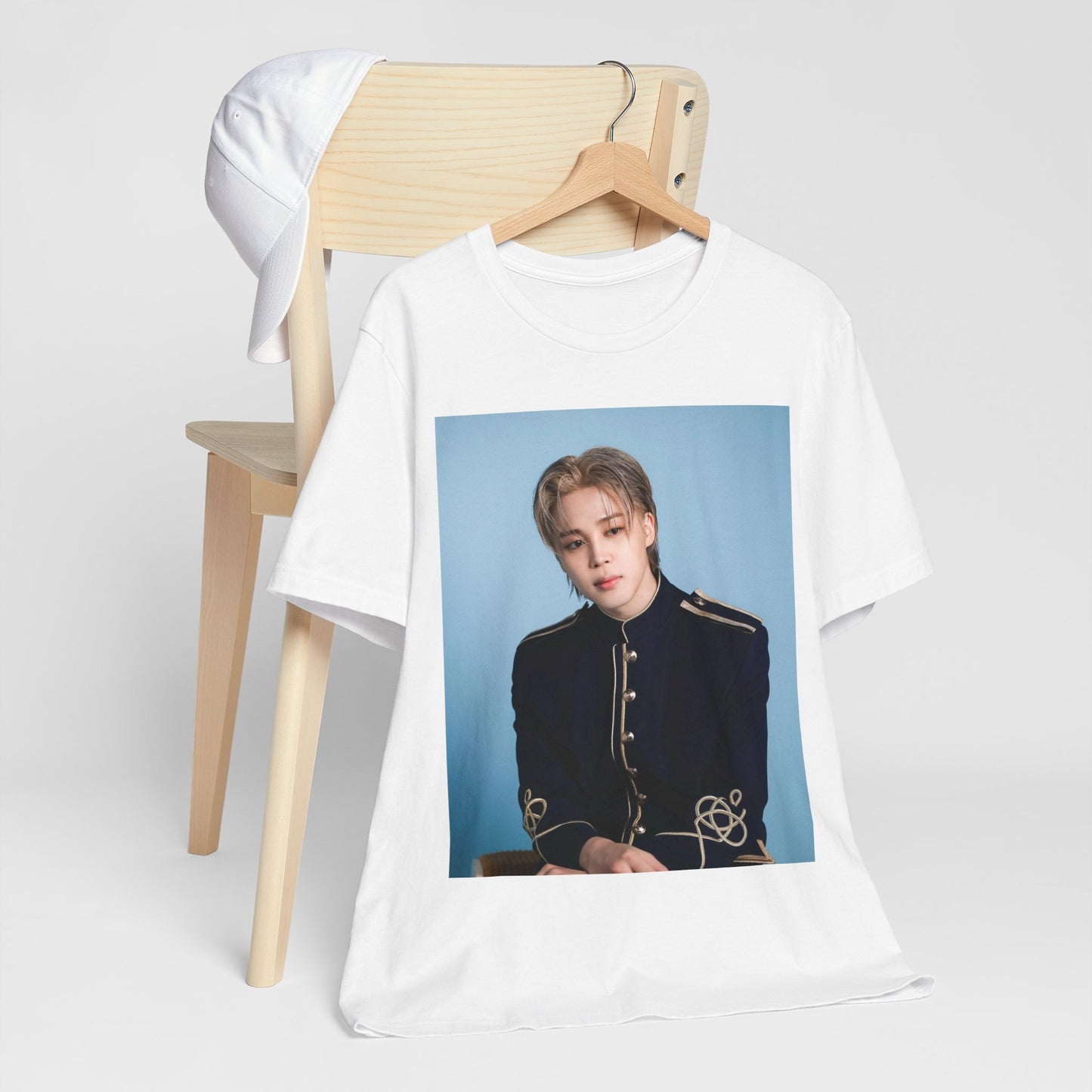 A black graphic t-shirt featuring a graphic related to Jimin's 'FACE' album era.