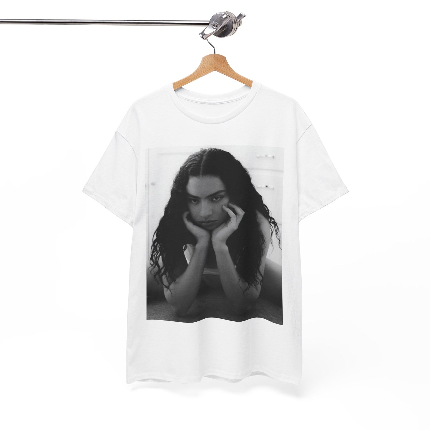 A black graphic t-shirt featuring a black and white, monochrome graphic or photo of Charli XCX.