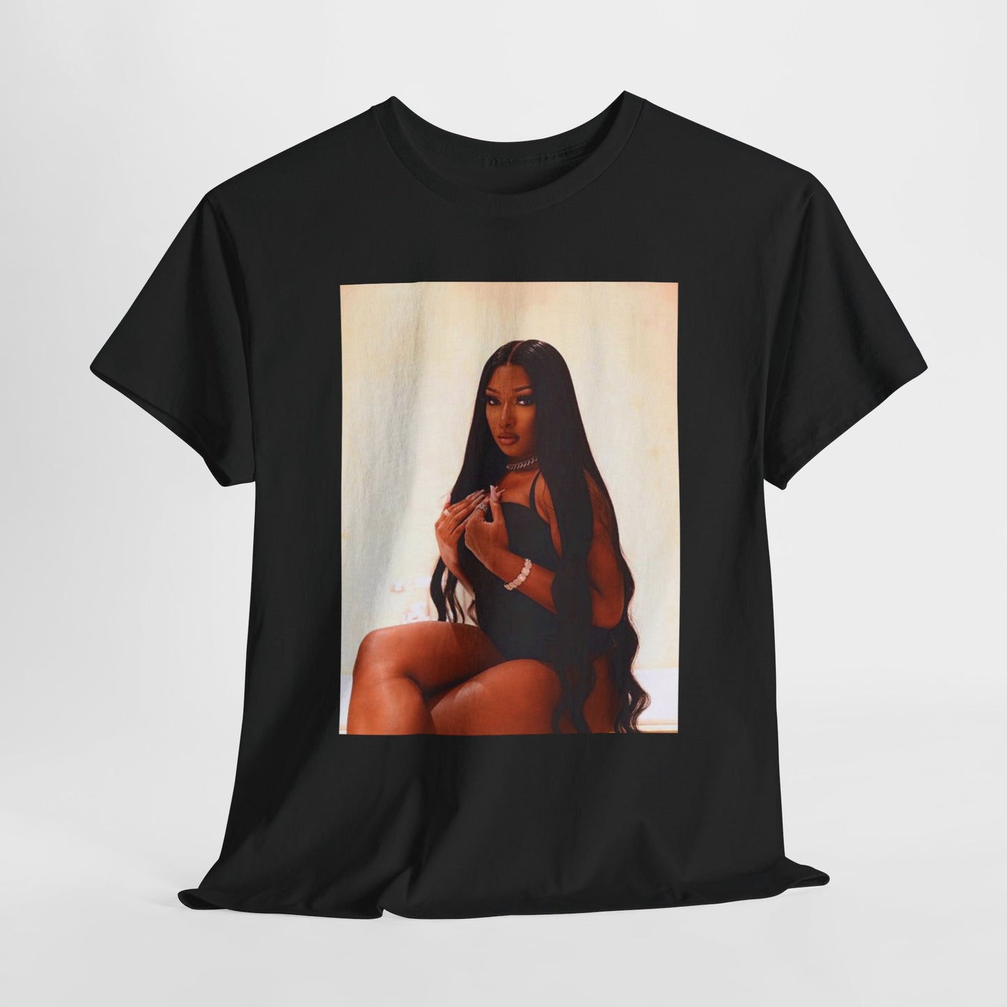 A black graphic t-shirt featuring a graphic of Megan Thee Stallion as the Queen of Rap.