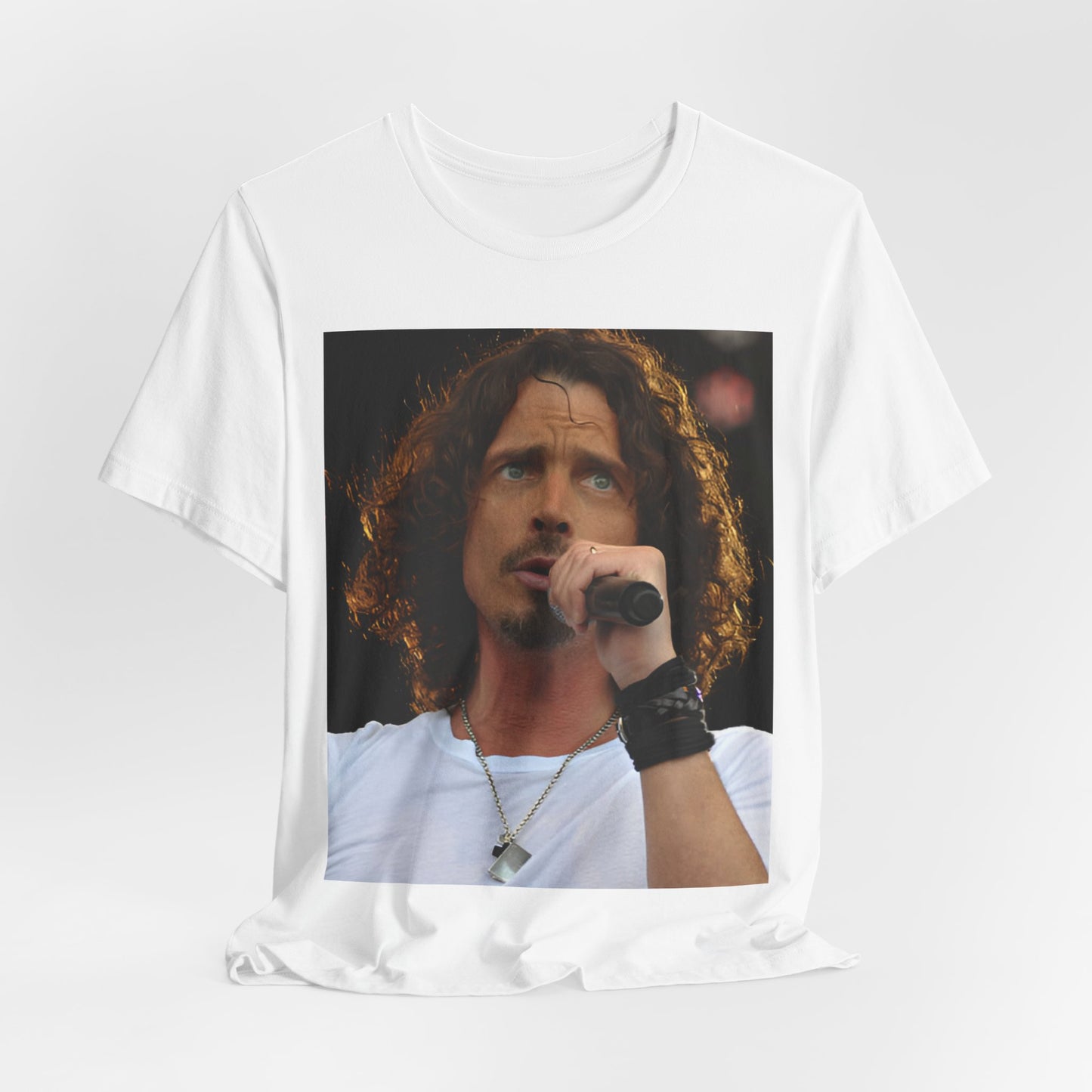 A black graphic t-shirt featuring a graphic related to Chris Cornell's song 'Like a Stone' or Audioslave.