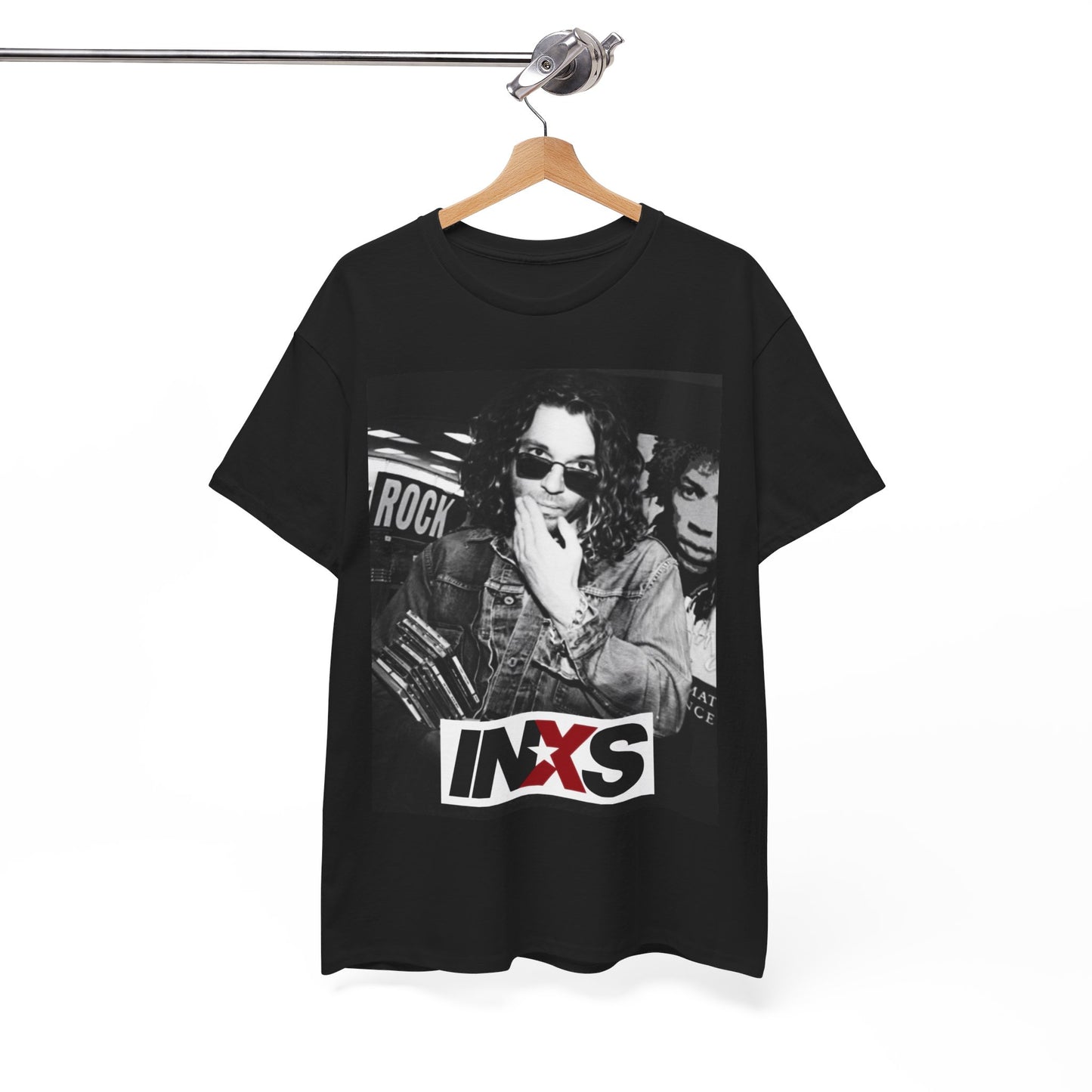 A black graphic t-shirt featuring a black and white, monochrome graphic or photo of INXS.