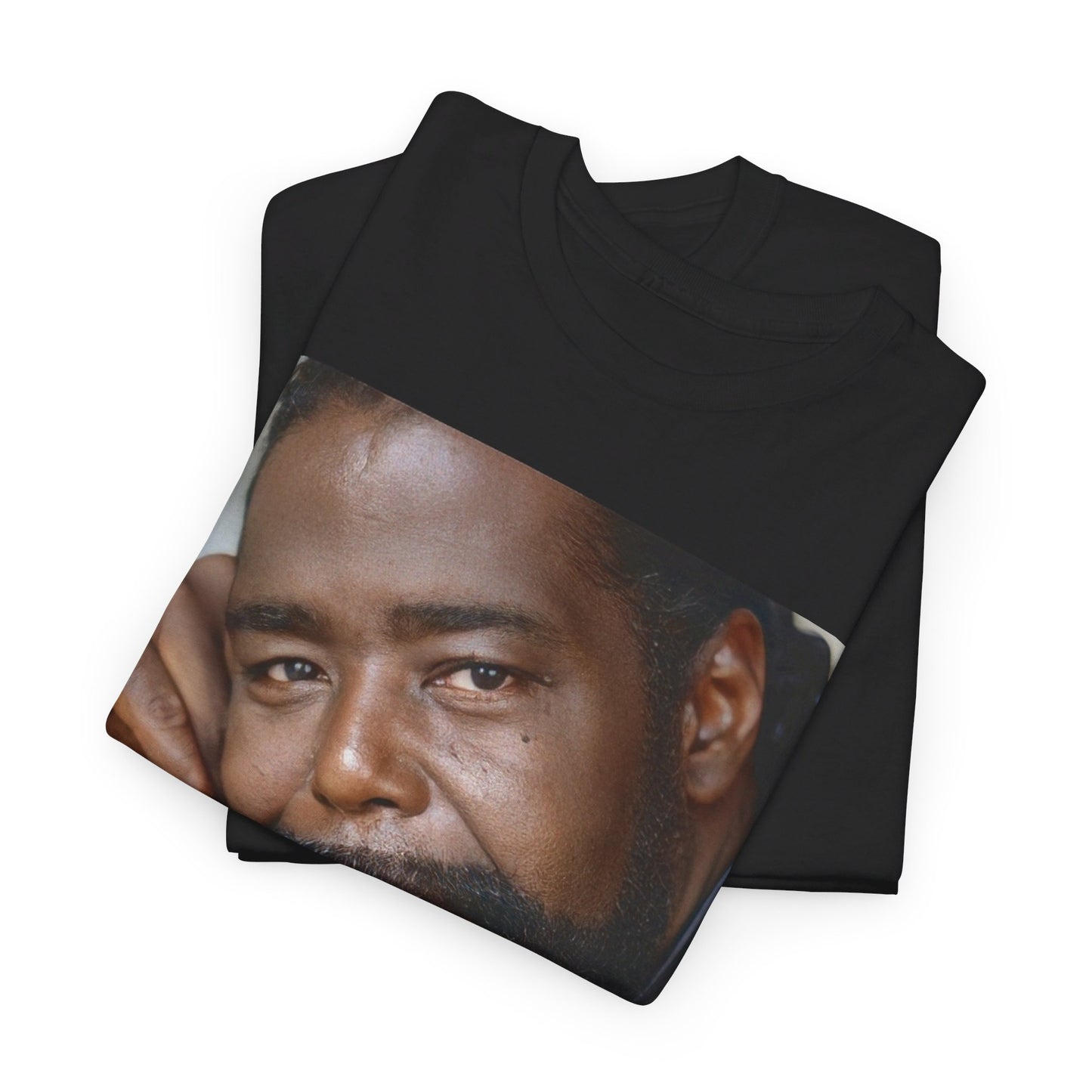 A black graphic t-shirt featuring a 70s-style pop art portrait graphic of Barry White.