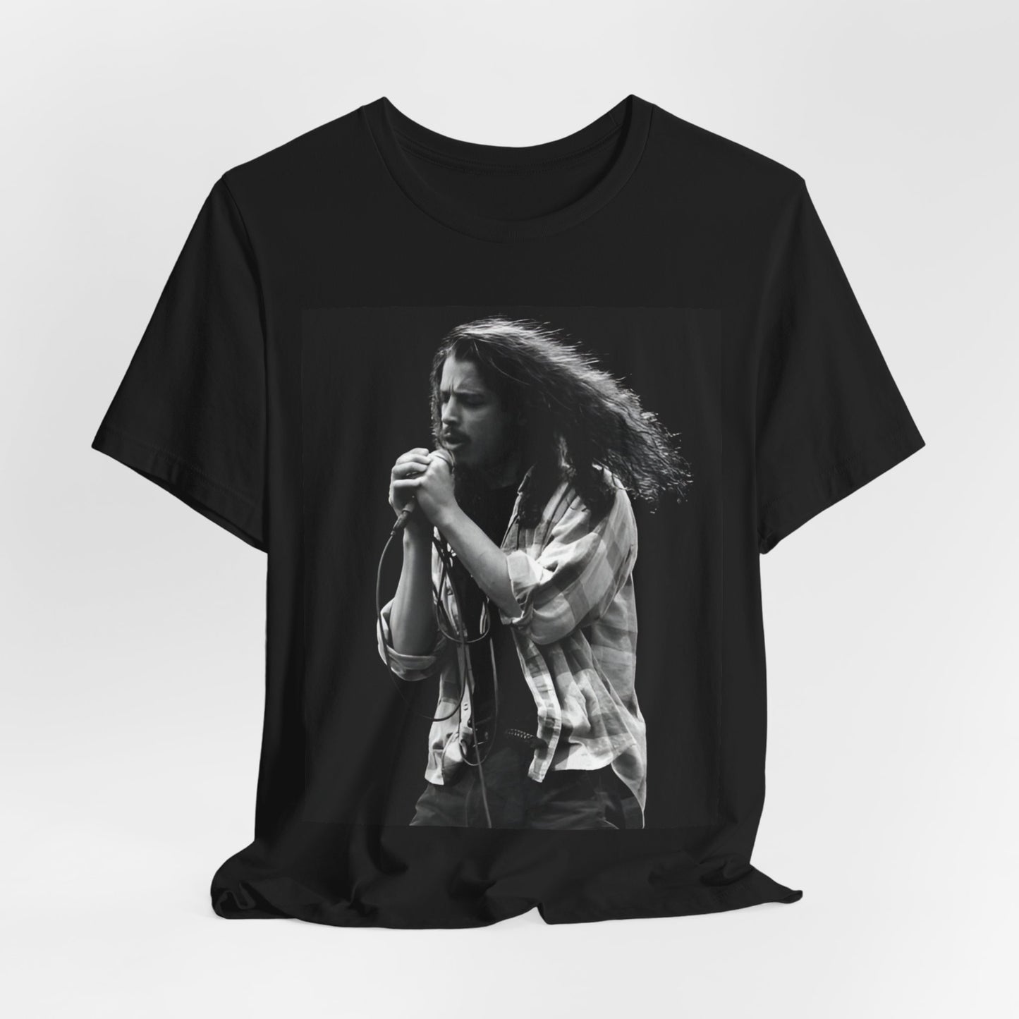 A black graphic t-shirt featuring a black and white graphic of Chris Cornell from 1996.