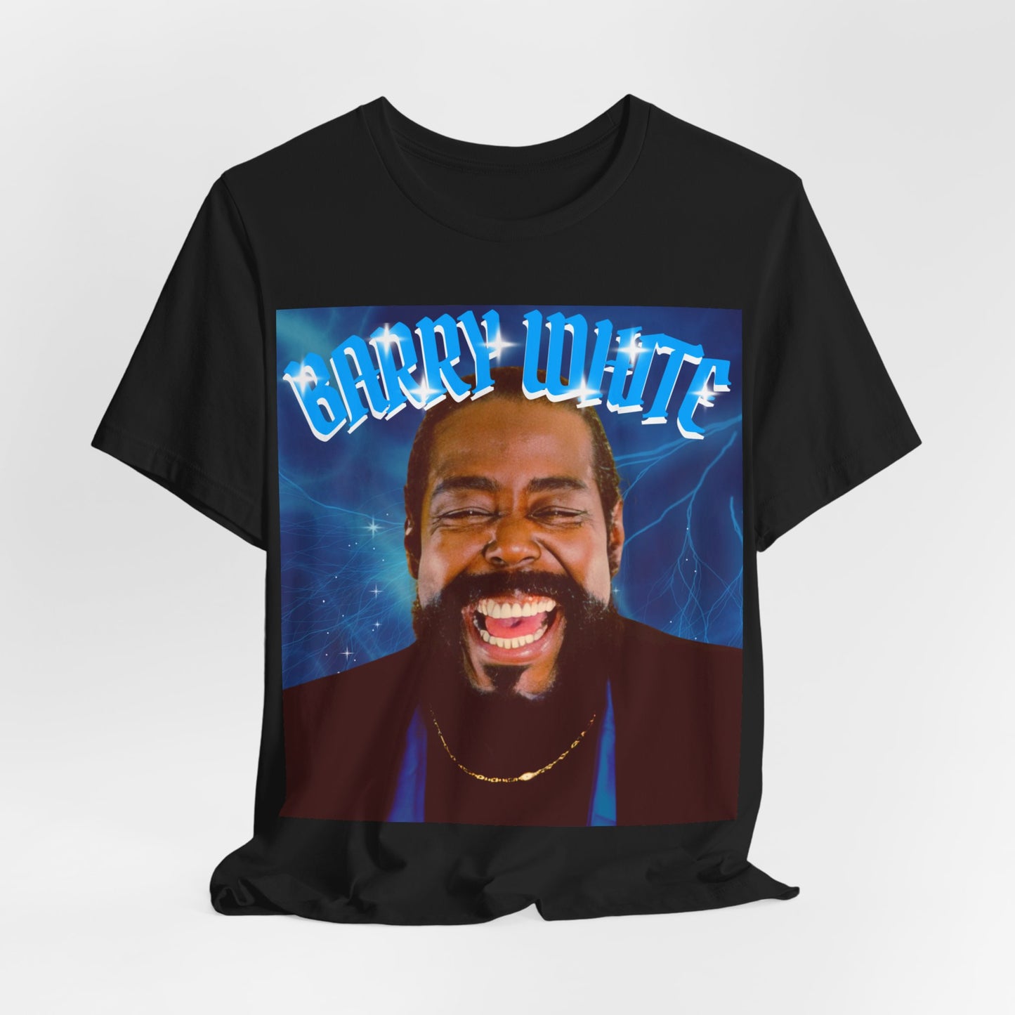 A black graphic t-shirt featuring a vintage 70s-style graphic of Barry White, emphasizing his smooth, iconic look.