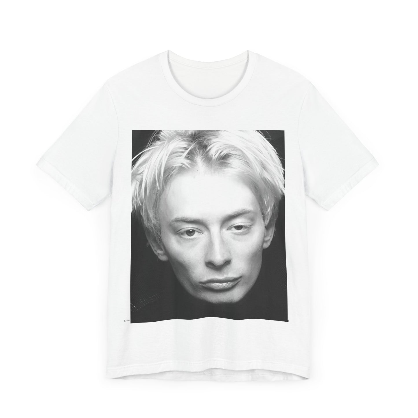 A black graphic t-shirt featuring a 90s black and white portrait photo of Thom Yorke from Radiohead.