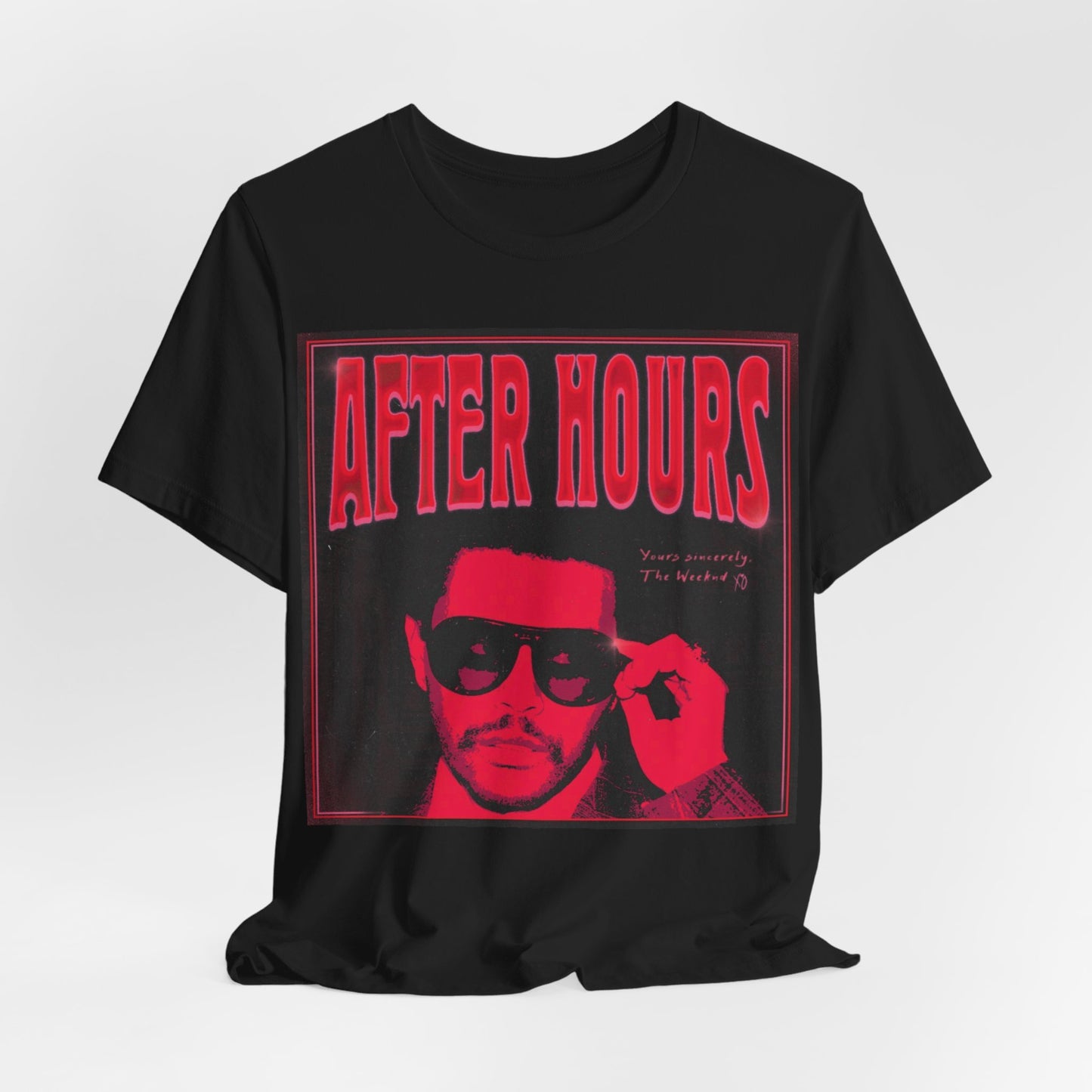 A black graphic t-shirt featuring a retro graphic related to The Weeknd's 'After Hours' album.