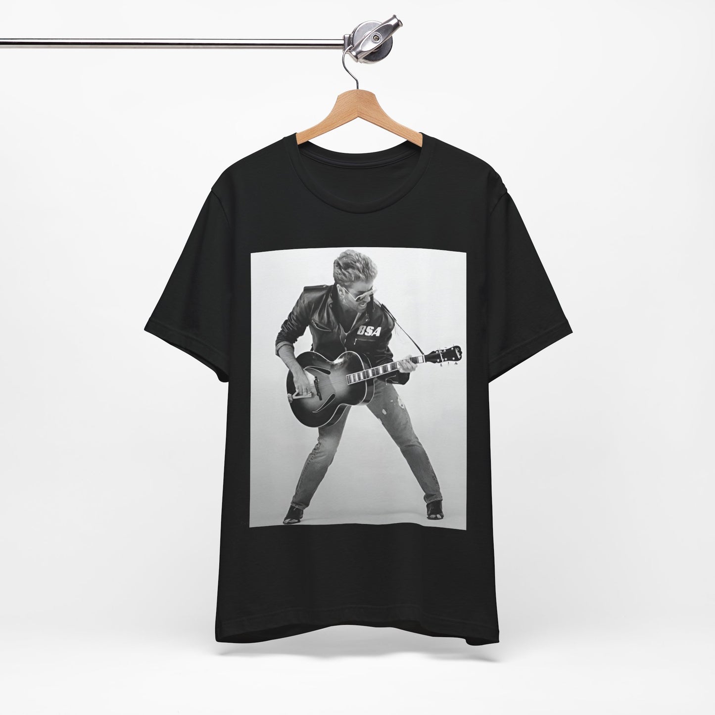A black graphic t-shirt featuring a graphic of George Michael with a guitar.