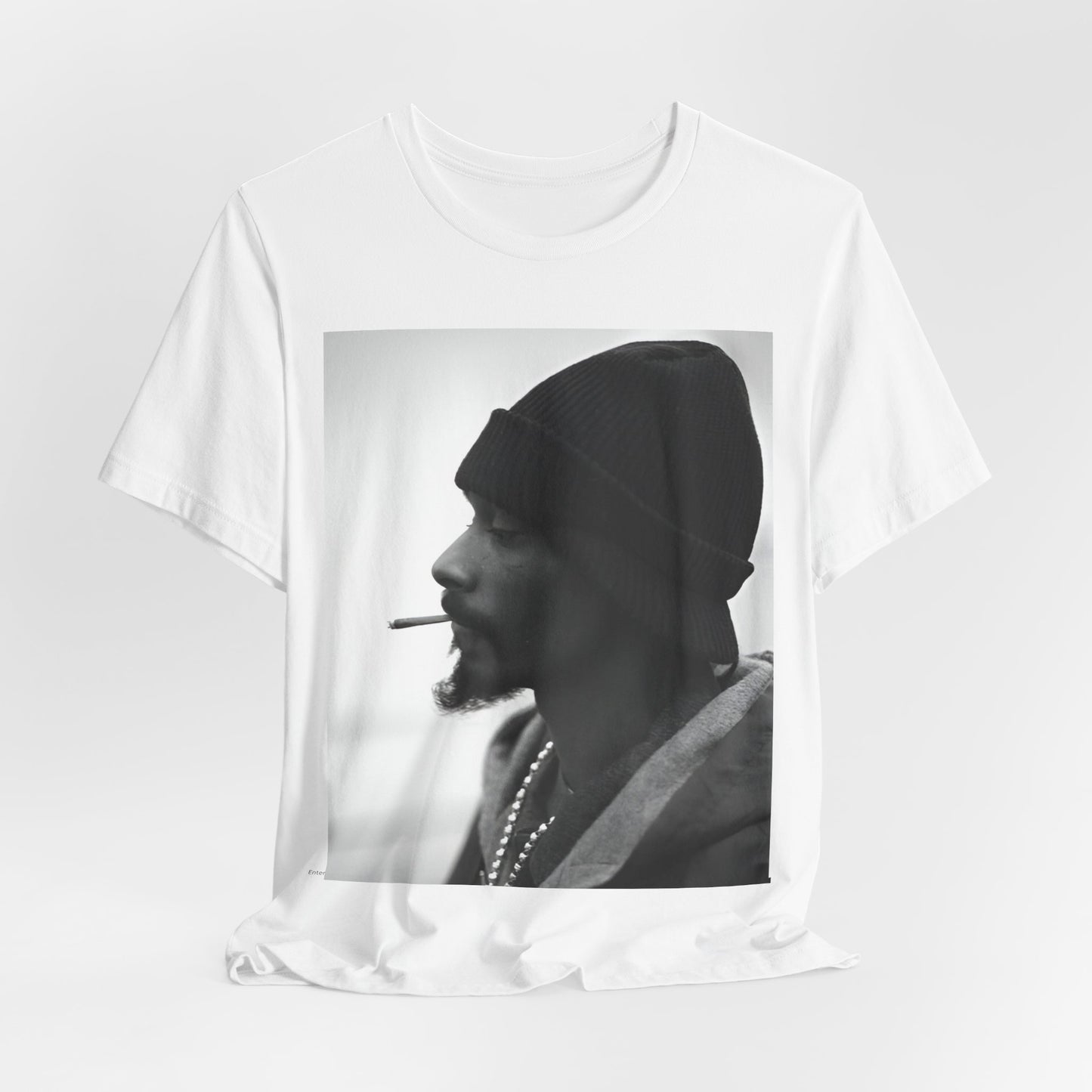 A black graphic t-shirt featuring a graphic of Snoop Dogg designed for everyday West Coast style.