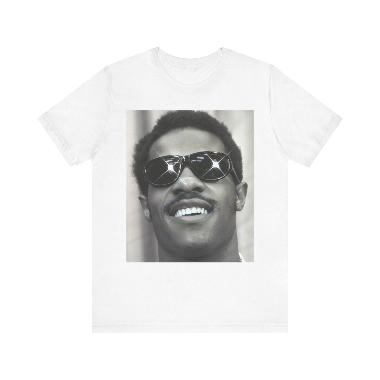 A black graphic t-shirt featuring a 70s funk aesthetic black and white graphic or photo of Stevie Wonder.