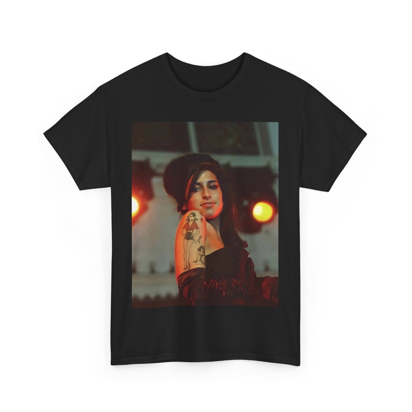 A black graphic t-shirt featuring a stylized graphic of Amy Winehouse, possibly with a crown or 'R&B Queen' text, emphasizing her soulful presence.