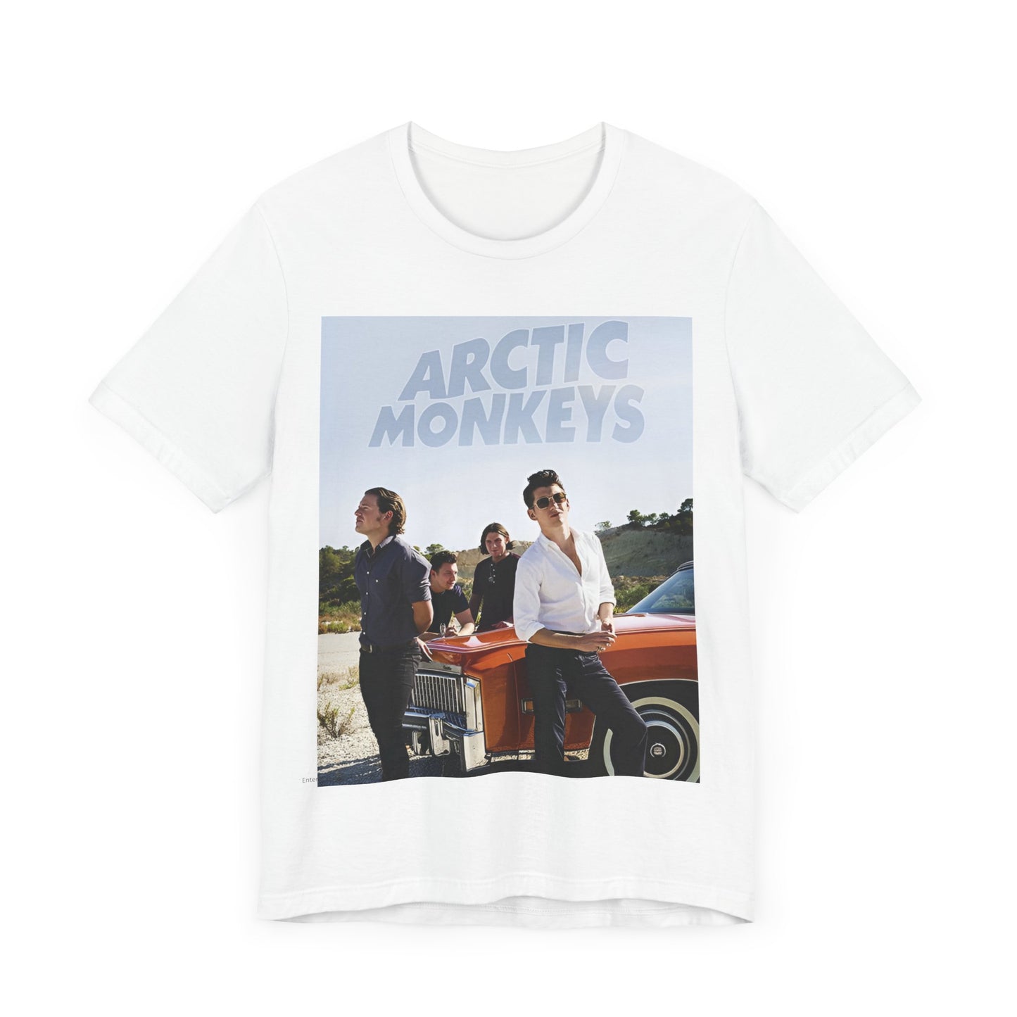 A black graphic t-shirt featuring a design related to Arctic Monkeys' 'AM' album era, possibly with the album art or band imagery.