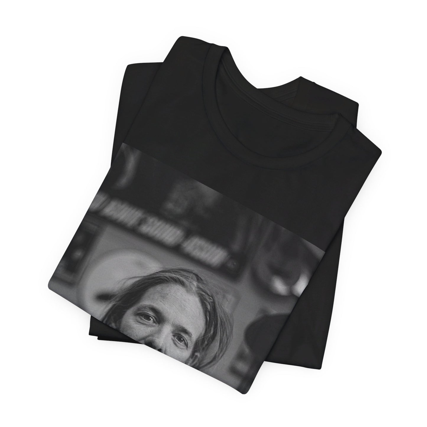 A black graphic t-shirt featuring a tribute graphic for Taylor Hawkins of Foo Fighters.