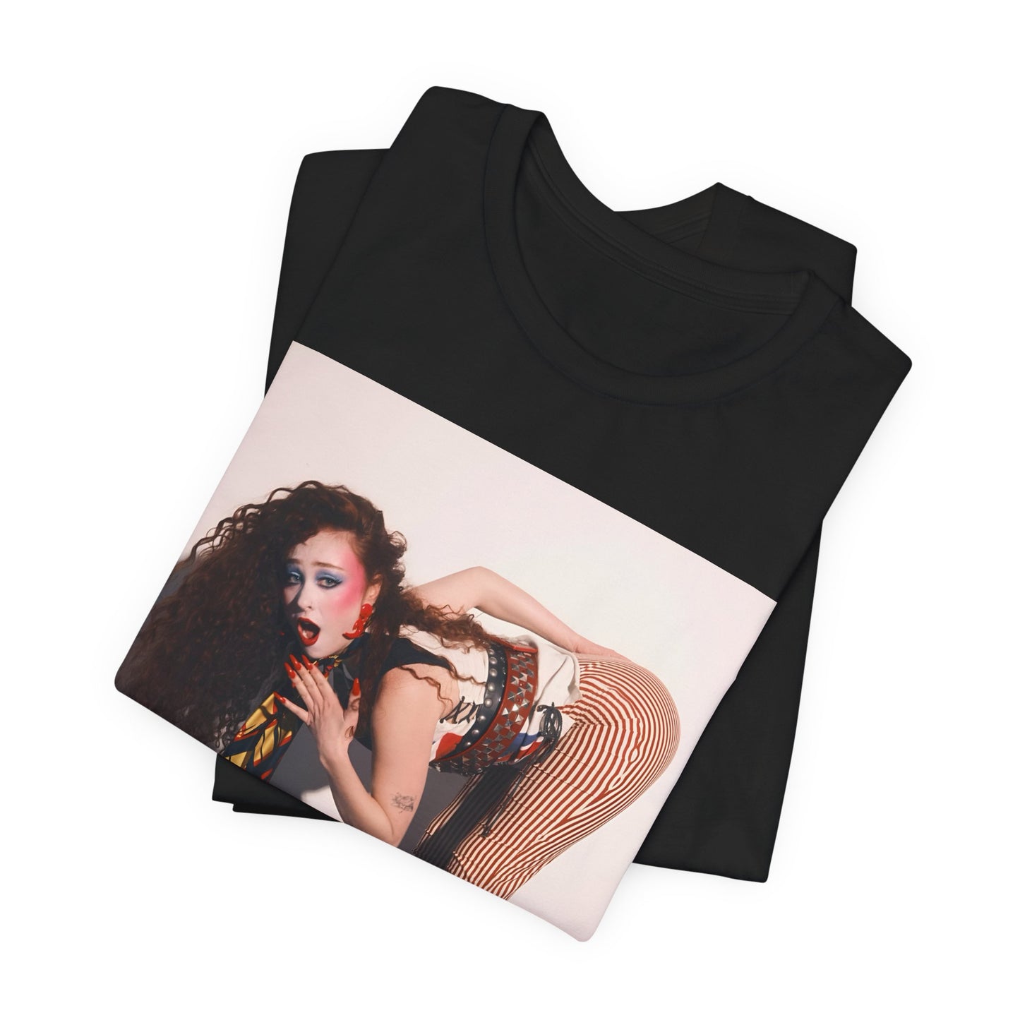 A black graphic t-shirt featuring a graphic of Chappell Roan with a 'Hot to Go!' theme, emphasizing her drag icon persona.