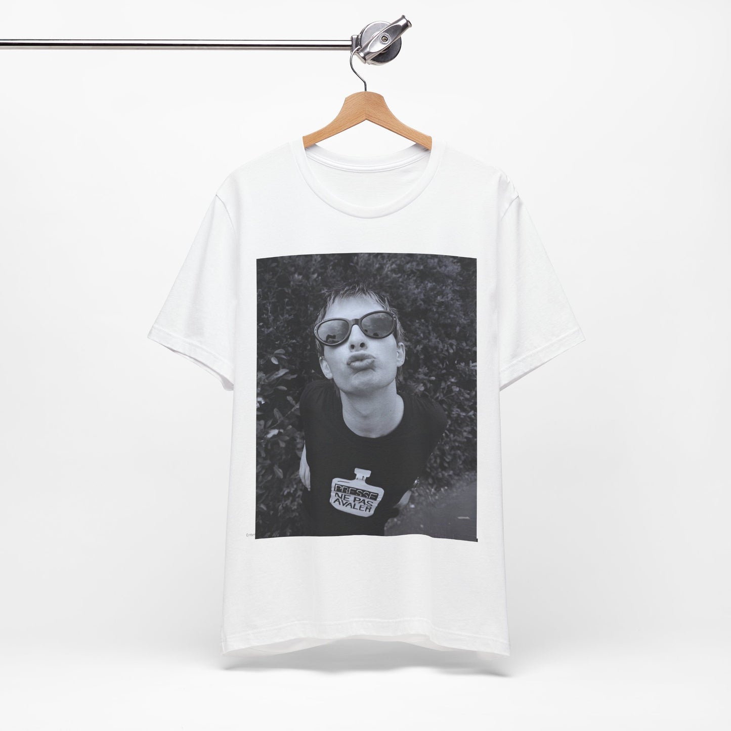 A black graphic t-shirt featuring a retro 90s graphic of Thom Yorke from Radiohead.