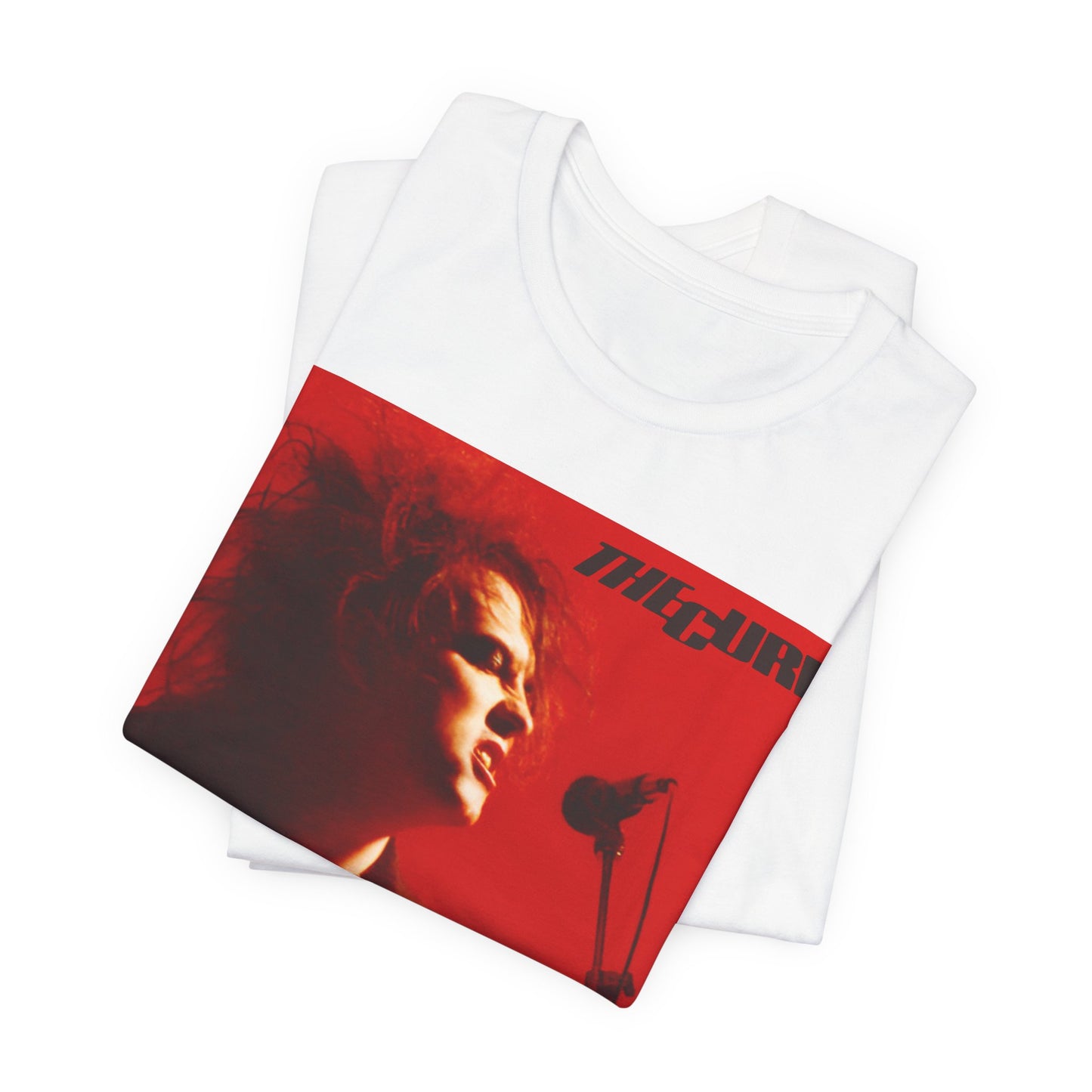 A black graphic t-shirt featuring a graphic of Robert Smith from The Cure with iconic red lipstick.