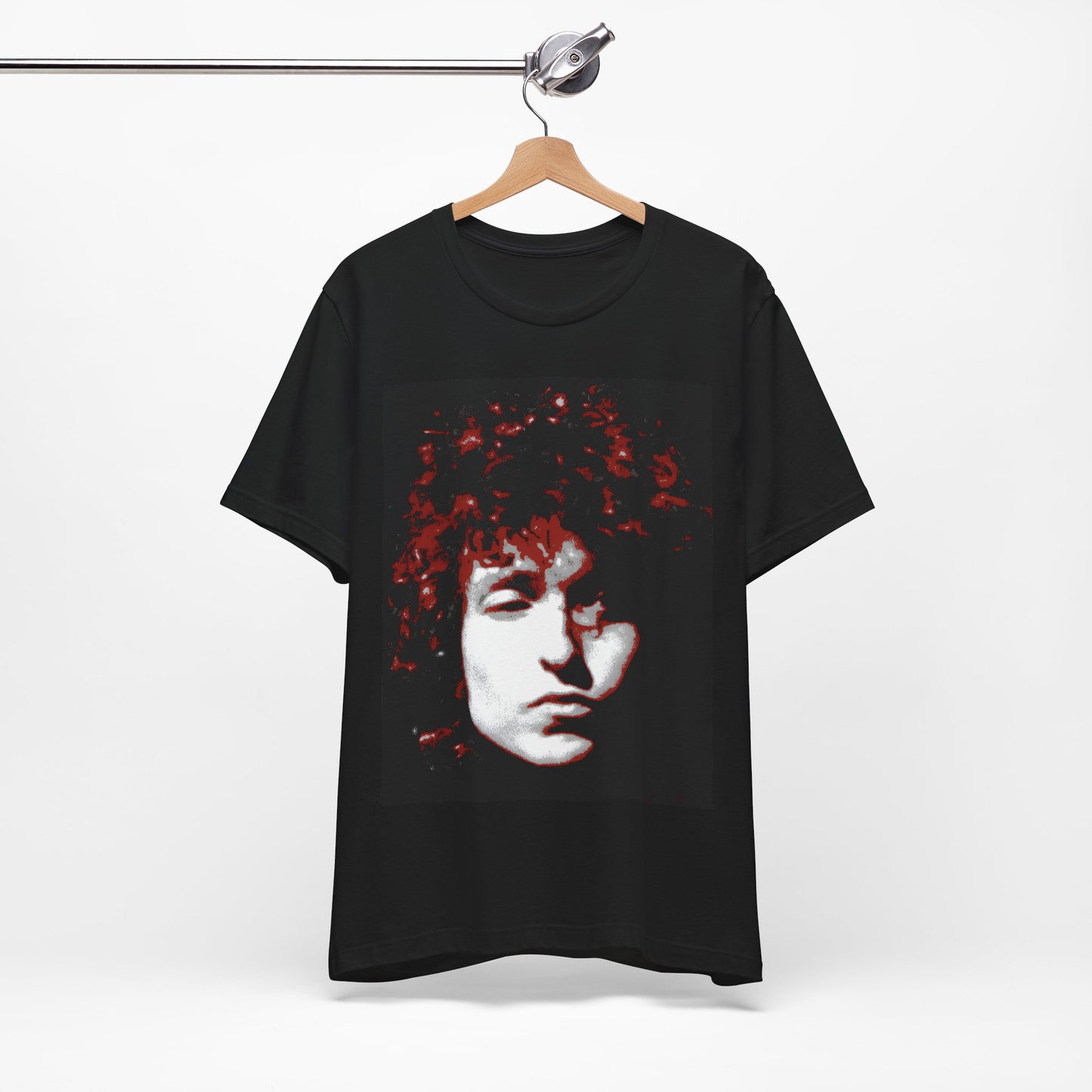 A black graphic t-shirt featuring a graphic related to Bob Dylan's 'Blood on the Tracks' album era, possibly with album art elements.