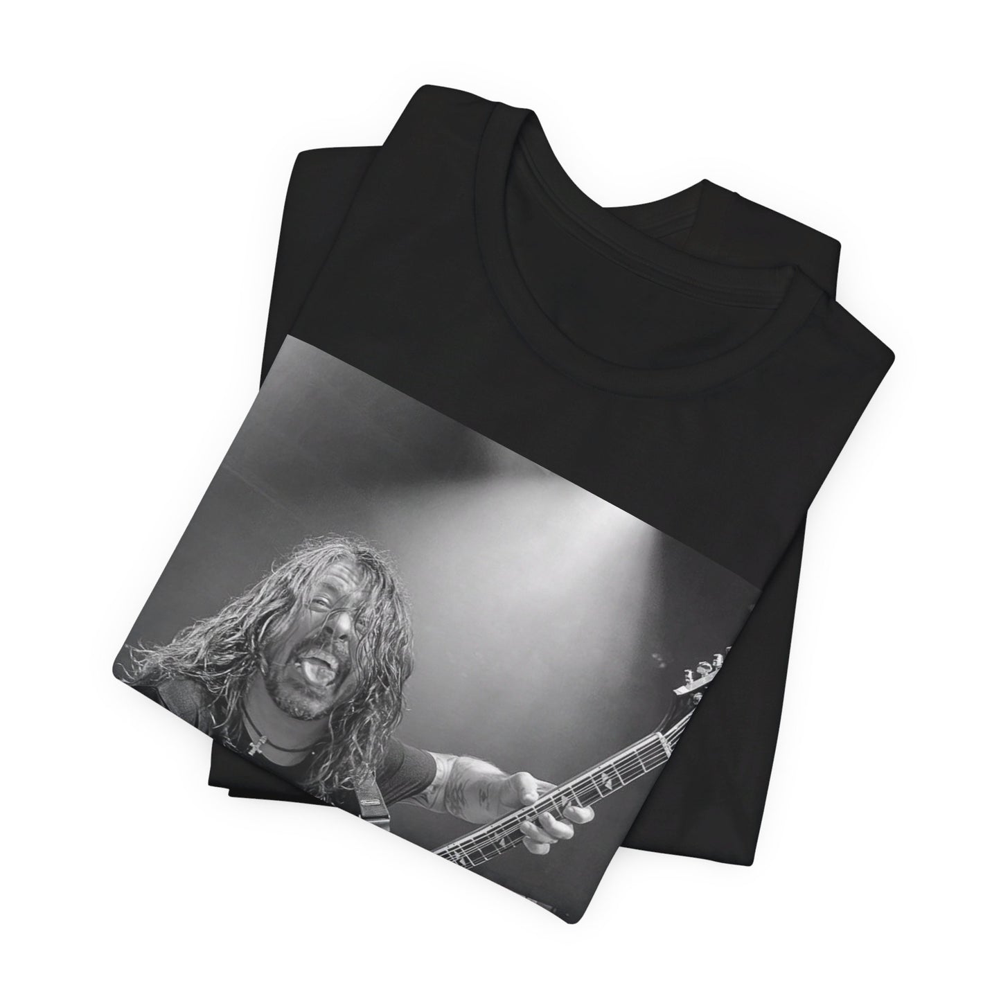 A black graphic t-shirt featuring a graphic of Dave Grohl from Foo Fighters playing guitar in concert.