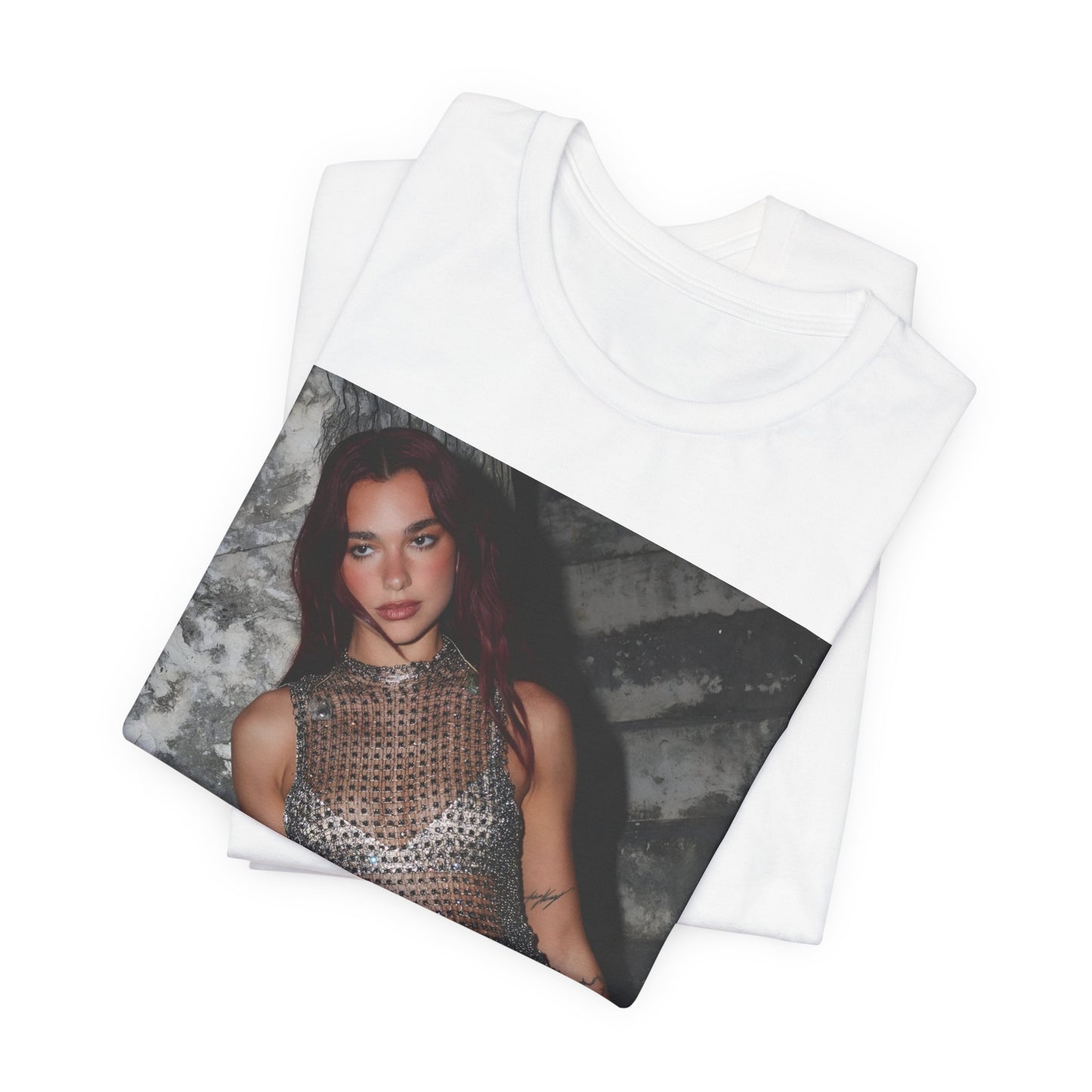 A black graphic t-shirt featuring a graphic of Dua Lipa as a disco queen, with an aesthetic design.