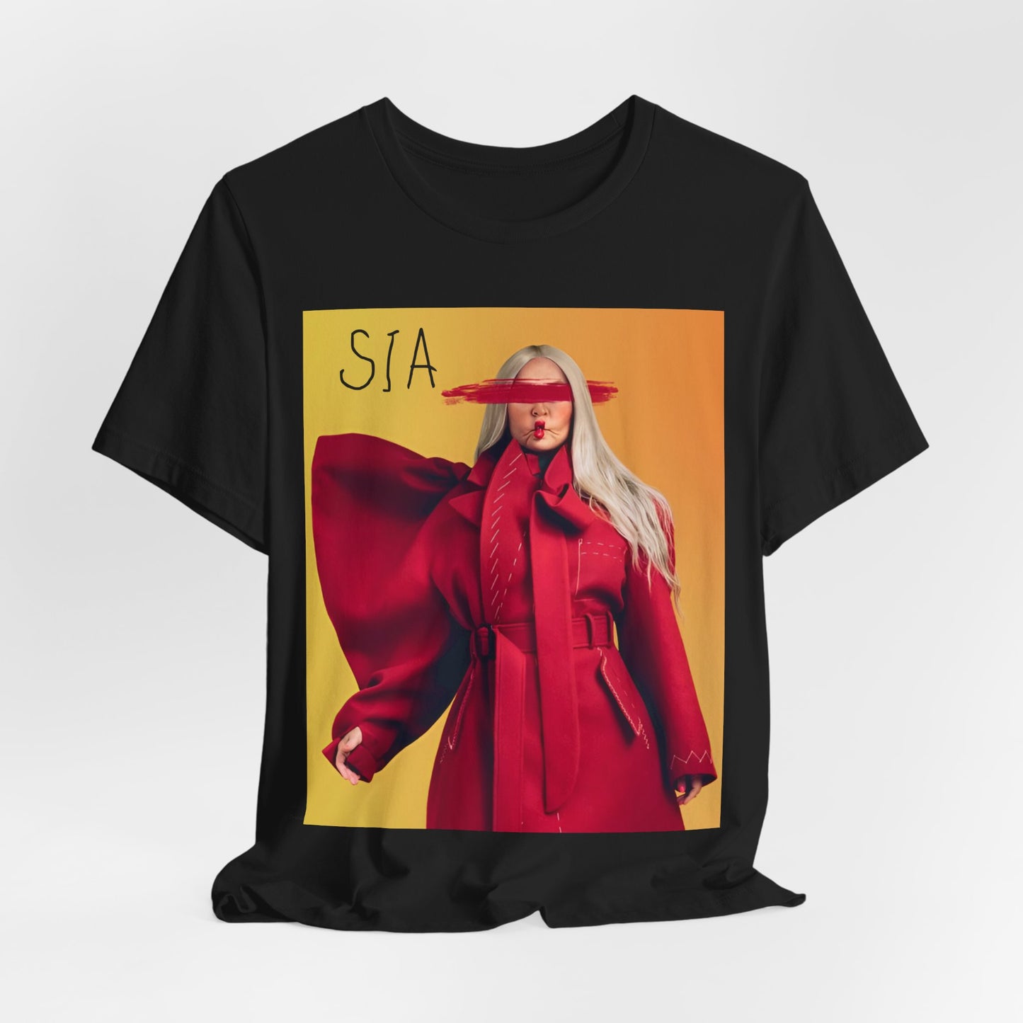 A black graphic t-shirt featuring a retro graphic related to Sia's '1000 Forms of Fear' album era.