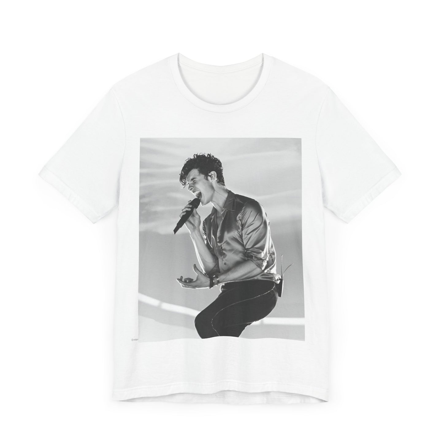 A black graphic t-shirt featuring a black and white graphic or photo of Shawn Mendes as a dreamy pop star.