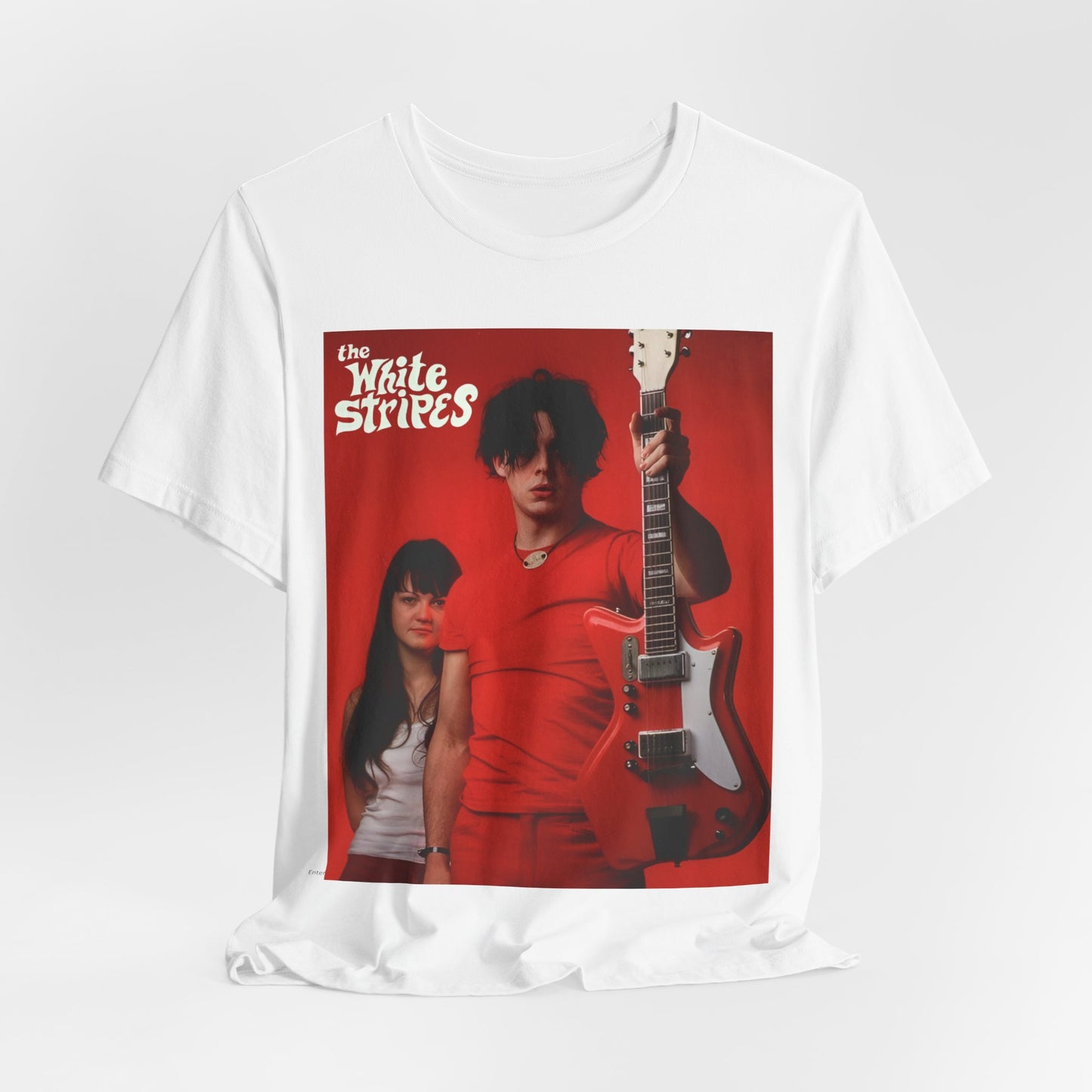 A black graphic t-shirt featuring a vintage garage rock graphic of The White Stripes.