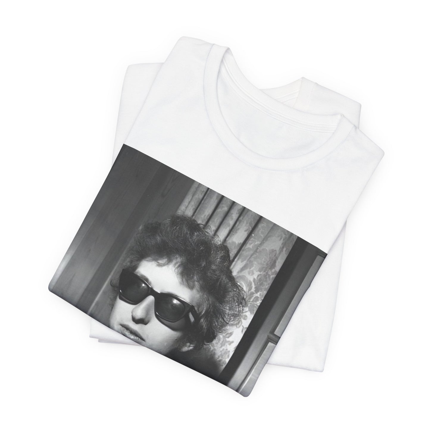 A black graphic t-shirt featuring a graphic related to Bob Dylan's 'The Freewheelin' album era.