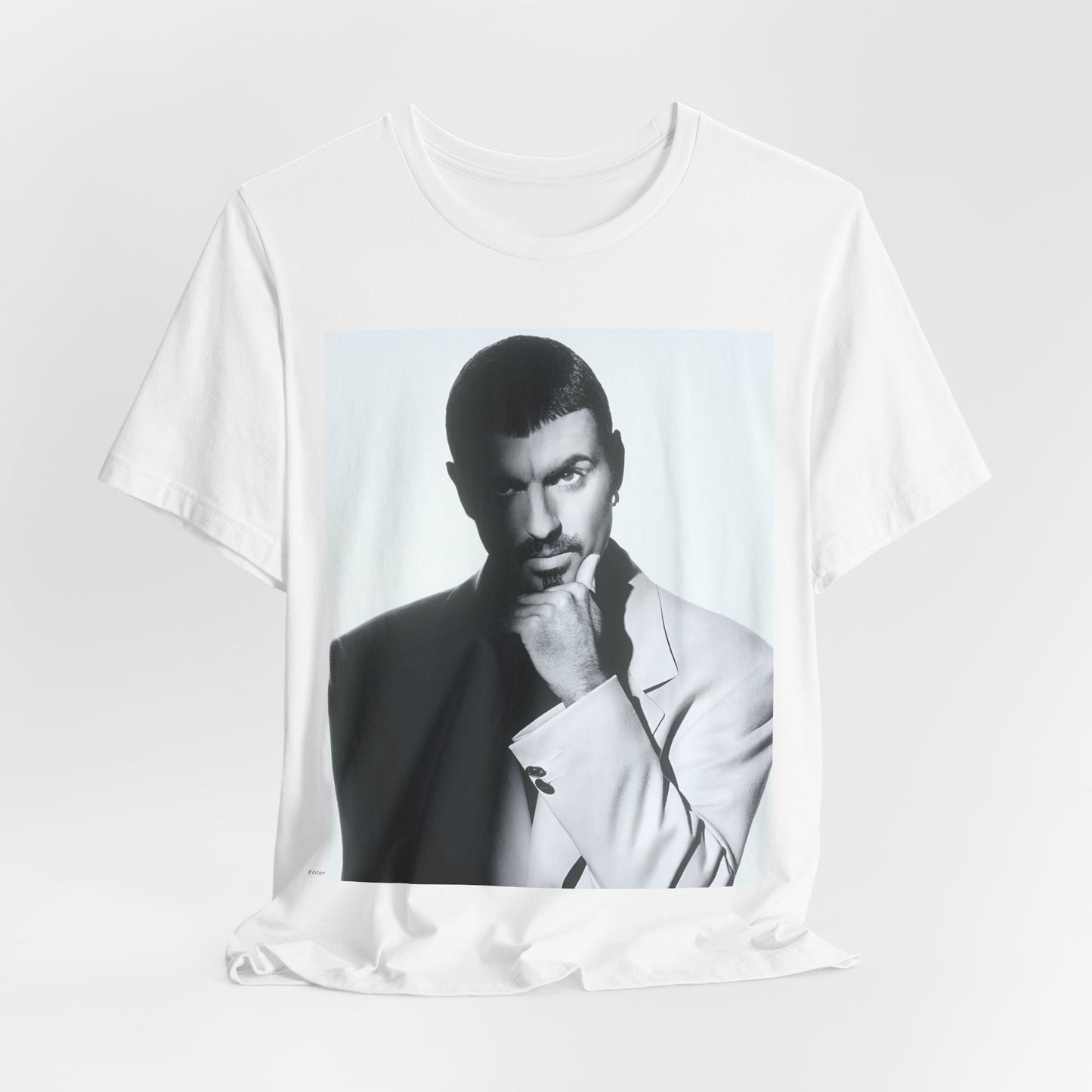 A black graphic t-shirt featuring a 90s aesthetic graphic of George Michael.