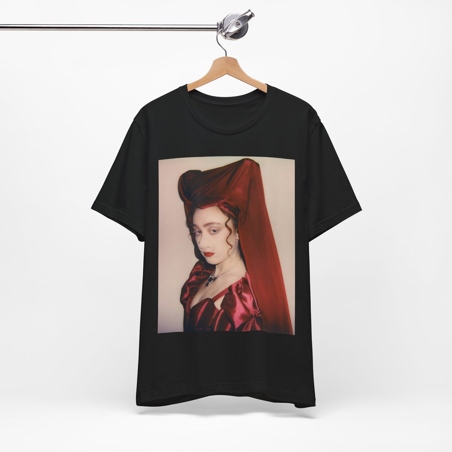 A black graphic t-shirt featuring a vintage-style graphic of Chappell Roan as a pop star.