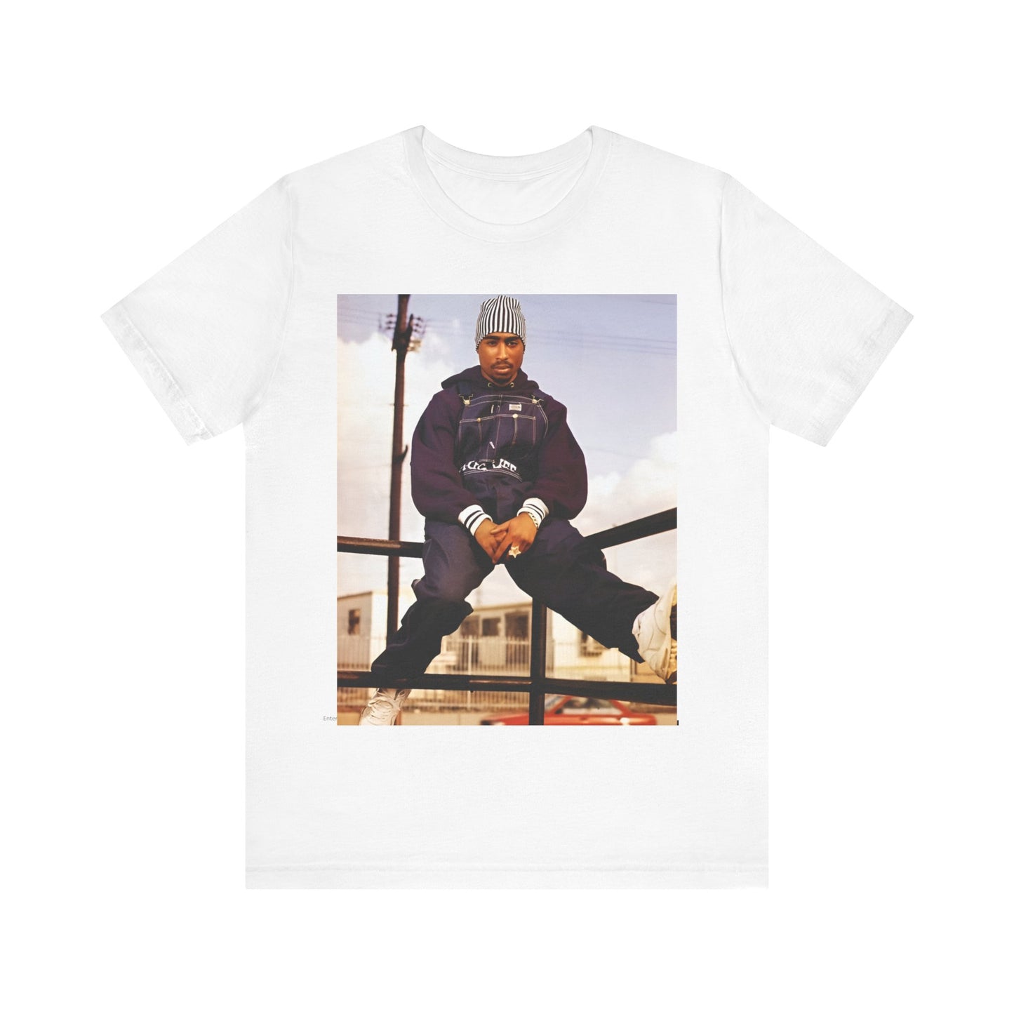 A black graphic t-shirt featuring a timeless rap legend graphic of Tupac.