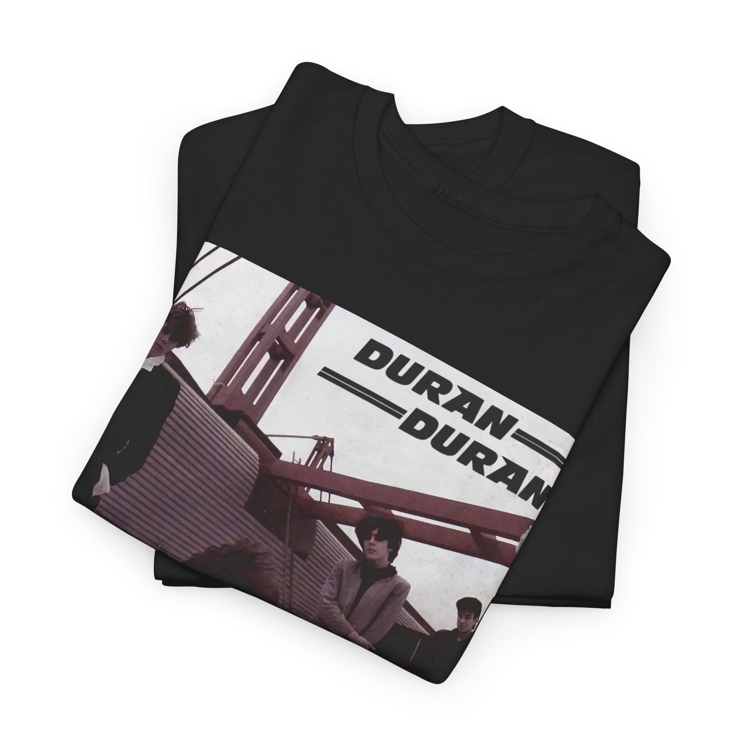 A black graphic t-shirt featuring a graphic related to Duran Duran's 'Hungry Like the Wolf' song or era.