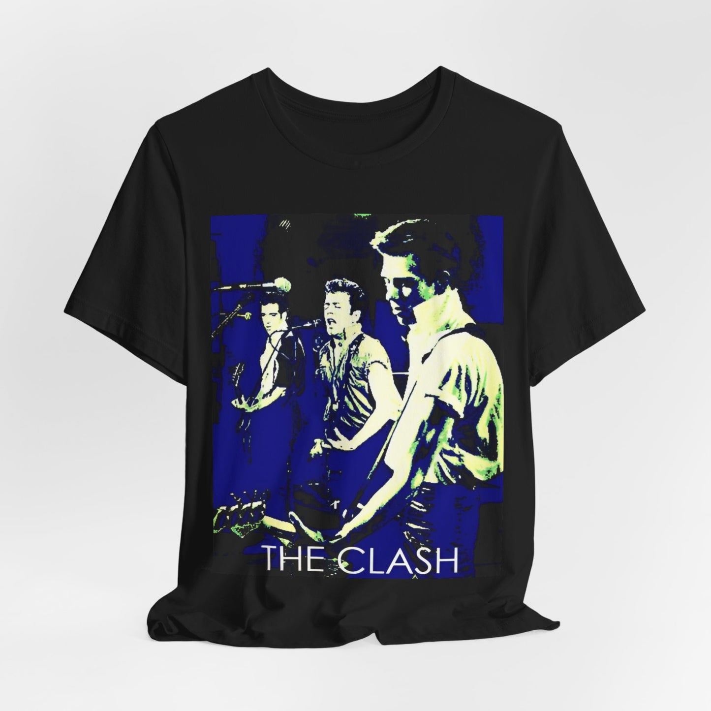 A black graphic t-shirt featuring a 70s aesthetic punk rock graphic of The Clash.