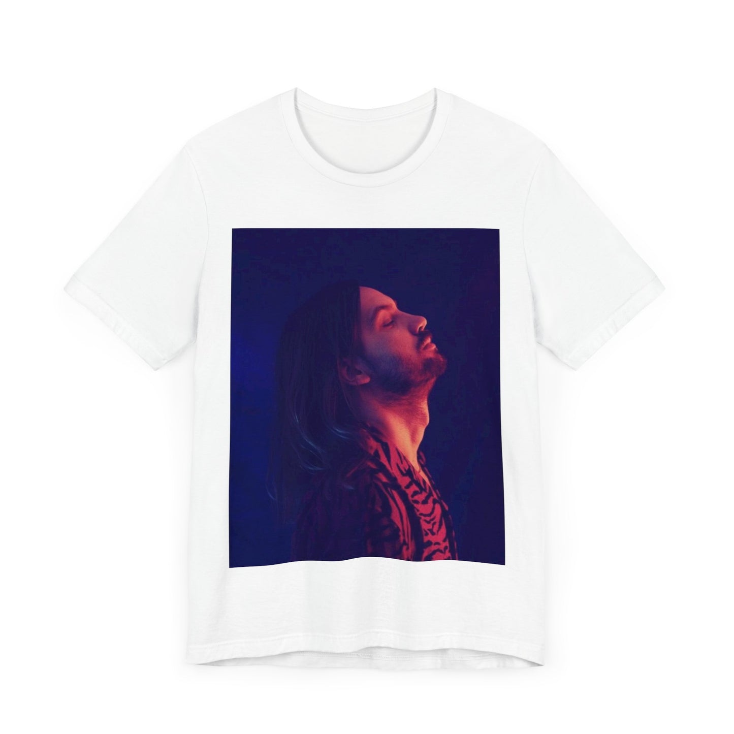 A black graphic t-shirt featuring a retro indie alt-rock graphic of Tame Impala.